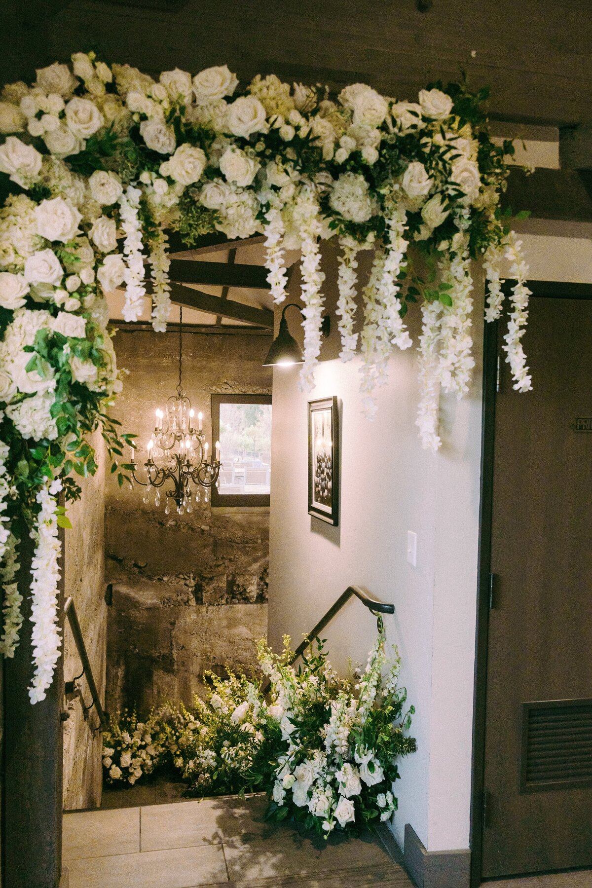 flower entrance, bridal shower, indoor entrance, garden arrangement, white flowers, 