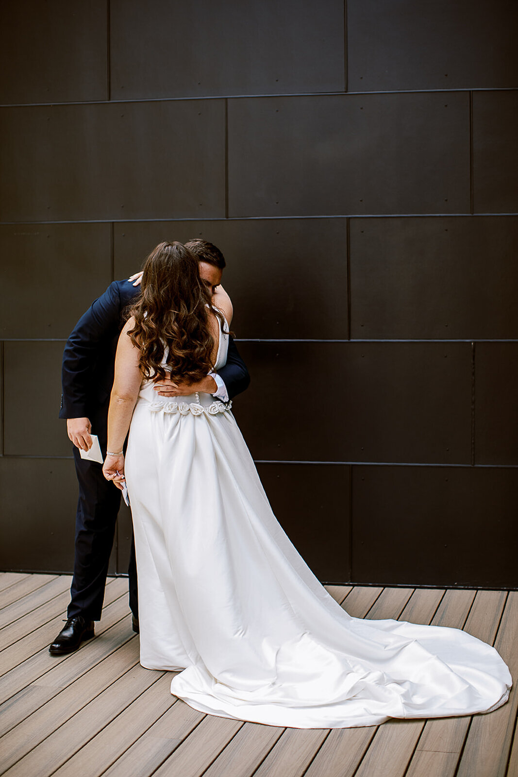 wedding couple kiss after first look during their destination wedding in breckenridge, colorado