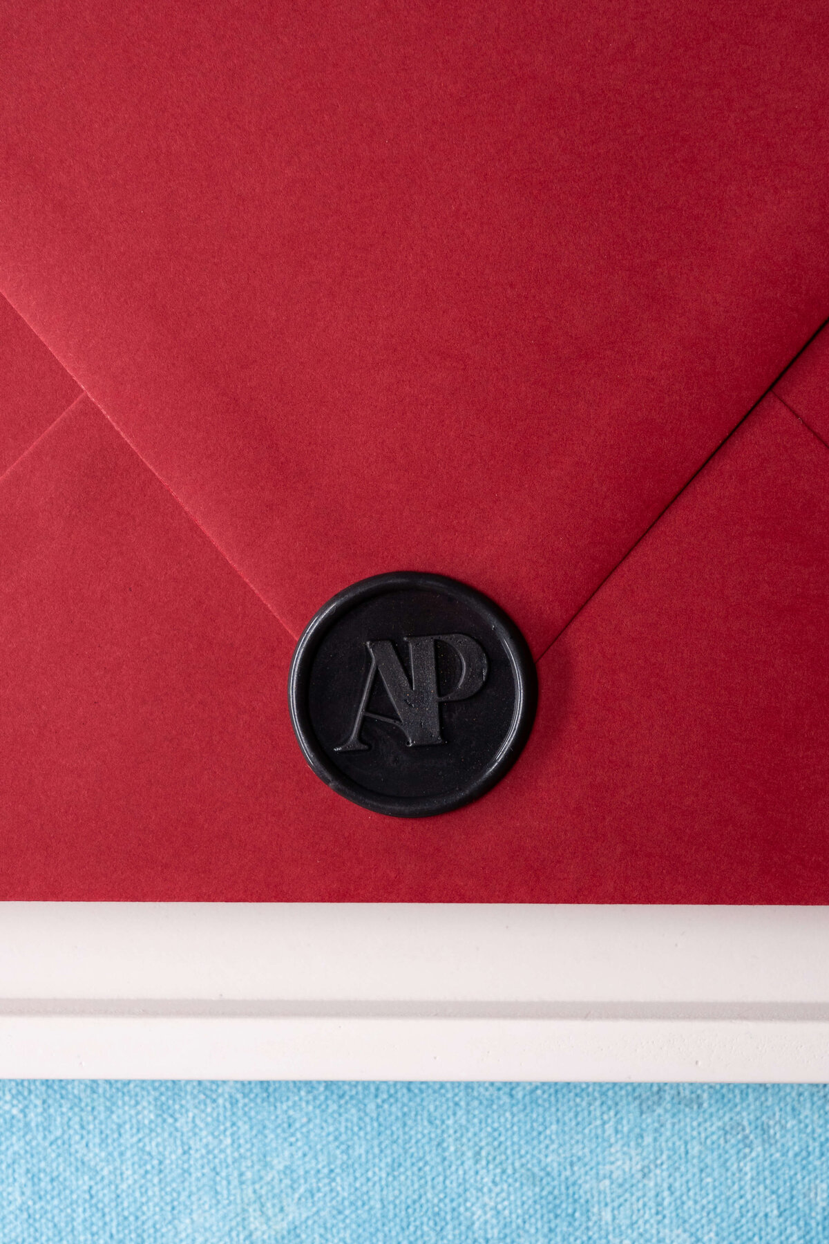 red-and-black-wedding-invitation-envelope-black-wax-seal