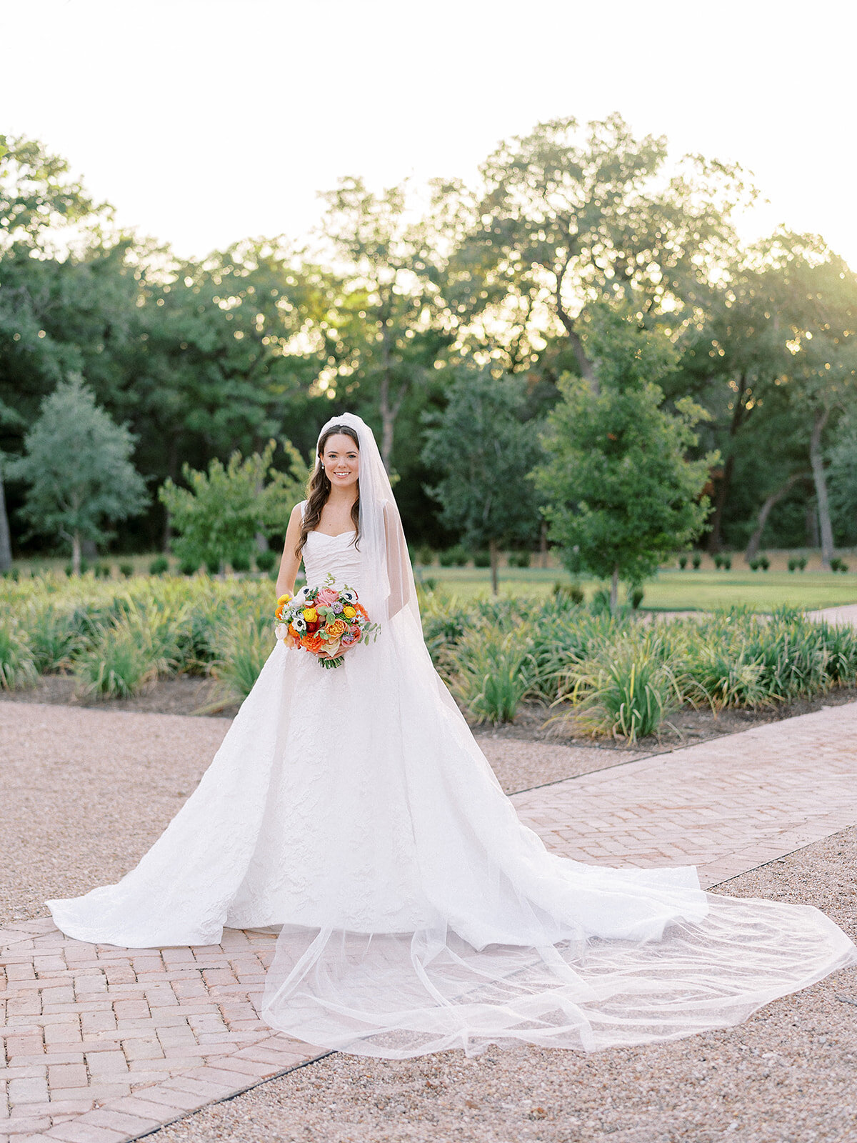 A classic bridal portrait in the gardens of The Grand Lady, one of Austin's best wedding venues