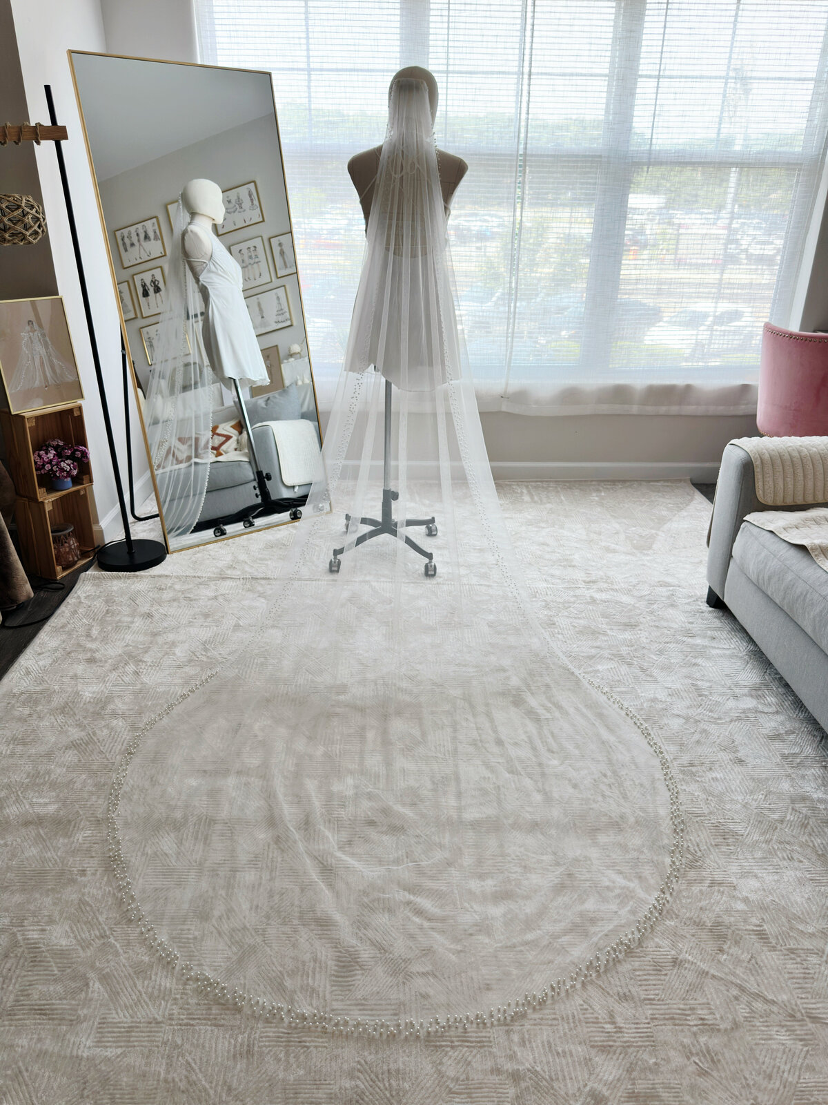 Soft ivory veil with dainty beaded trim and ethereal feel
