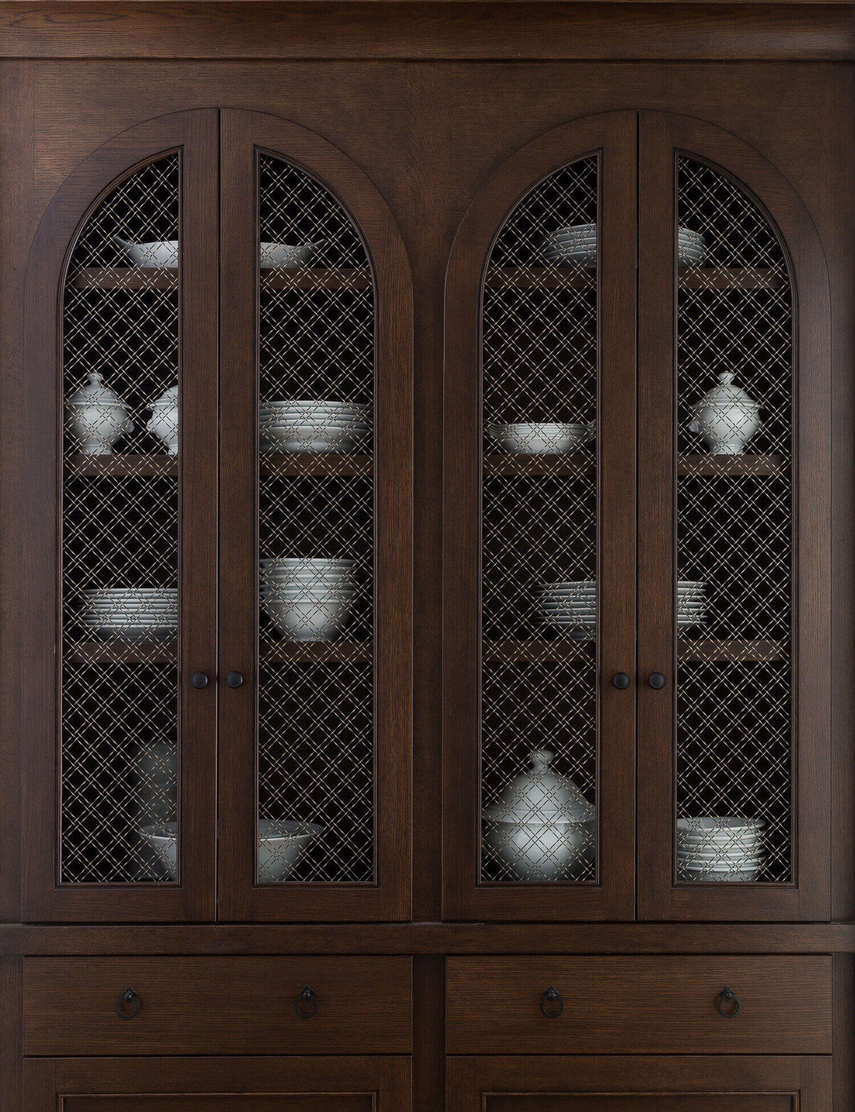 dark-wood-cabinet-arched-doors-white-dishware