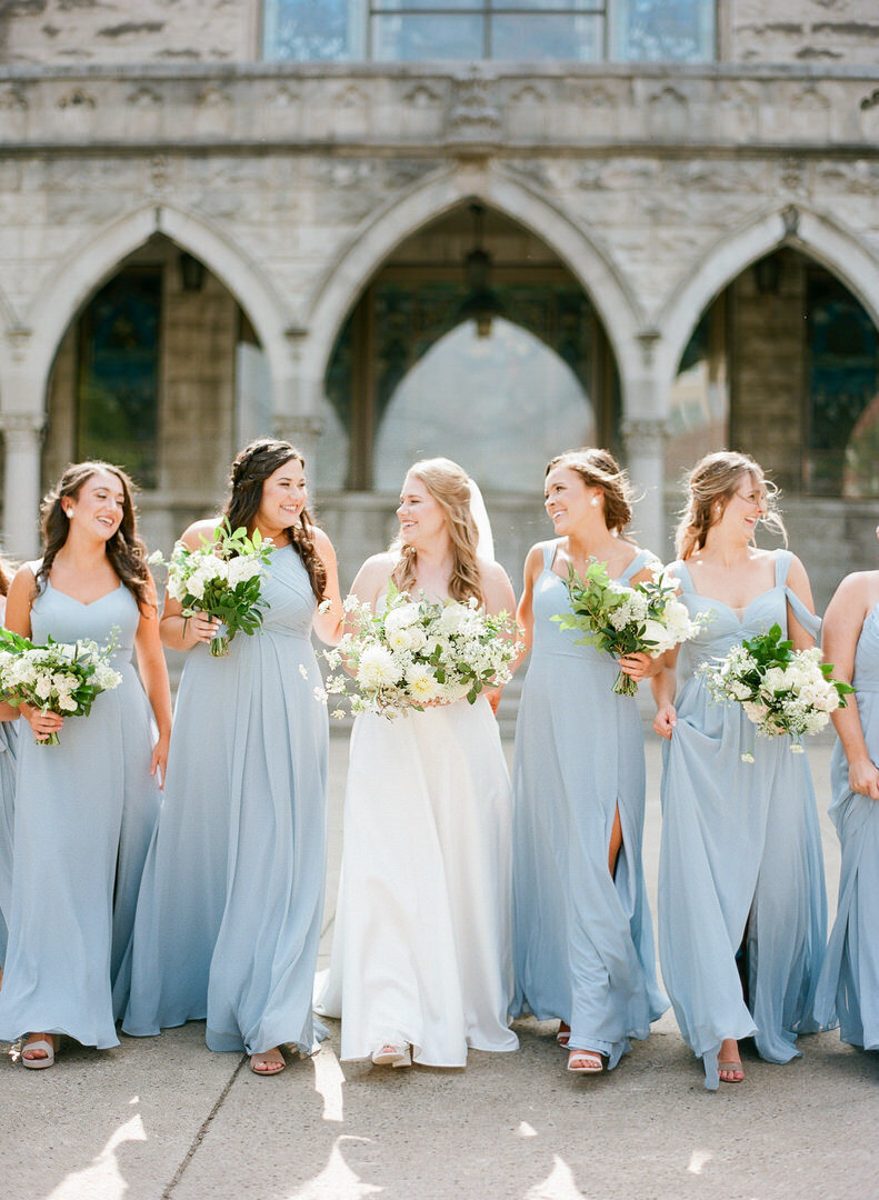 Asheville North Carolina Wedding Bride Walking with Bridesmaids in Blue Dresses