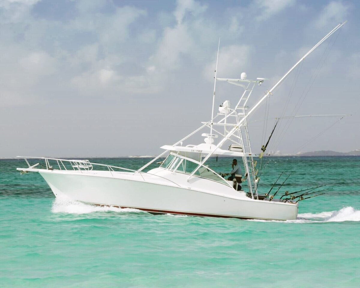 white boat on the caribbean ocean