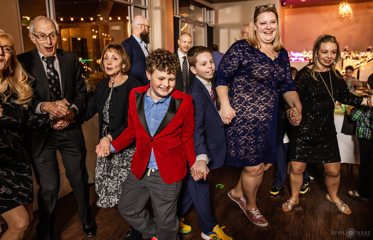 Capturing the Chaos of the Horah Dance at a Jewish Bar Mitzvah in Colorado