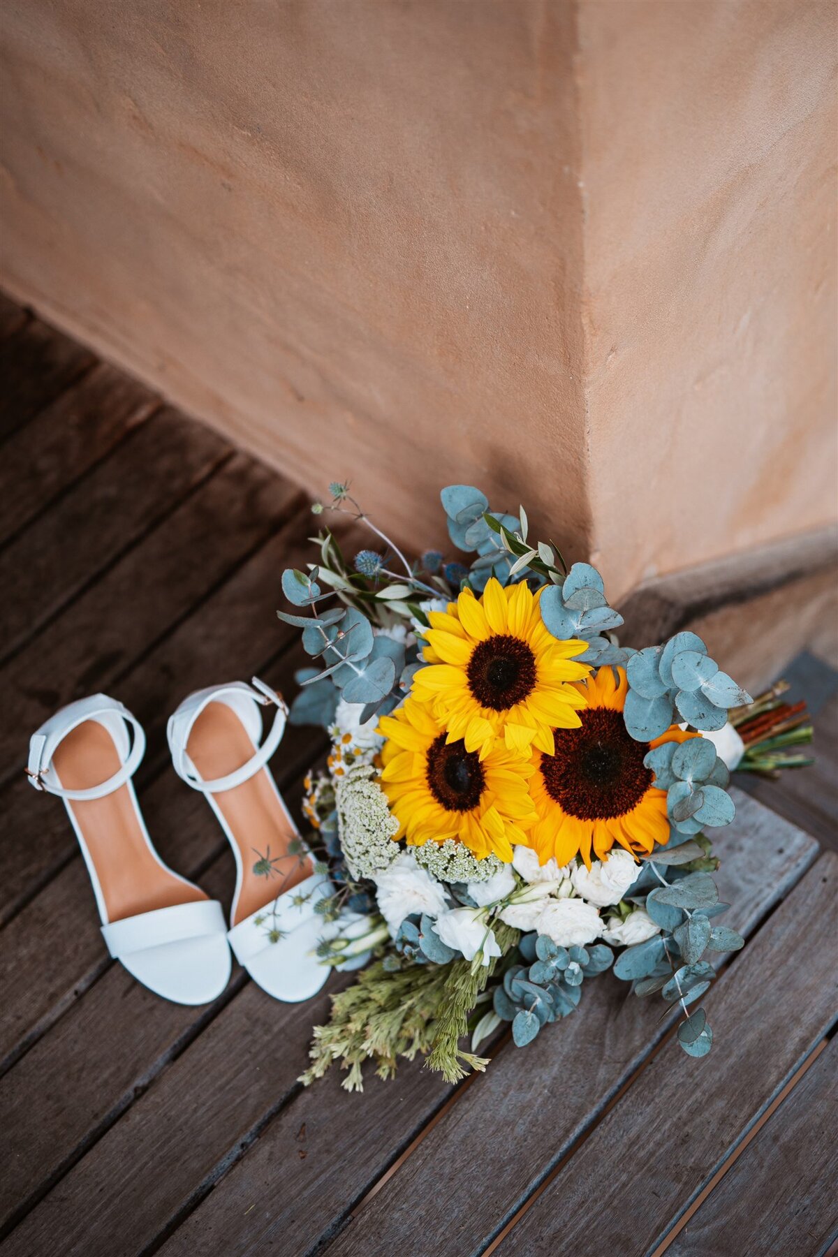 Kara's beautiful wedding shoes together with her flowers