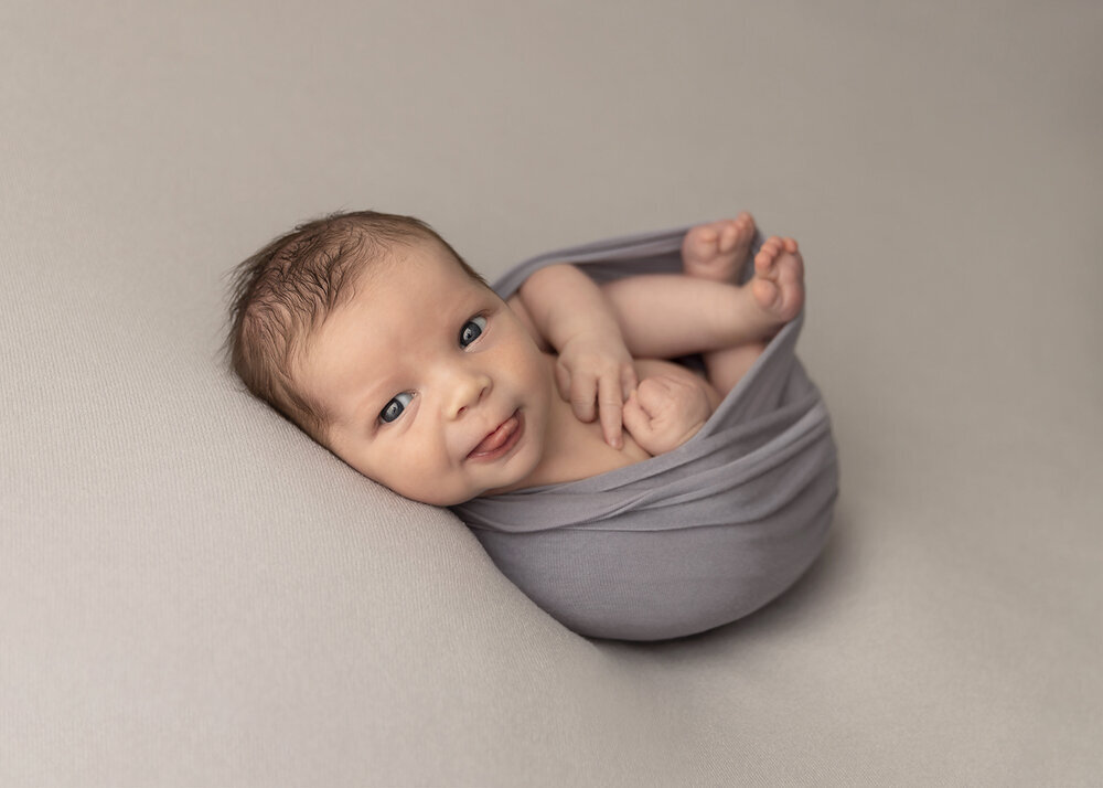 NEWBORN_BABYBOYWRAPPOSETONGUEOUT