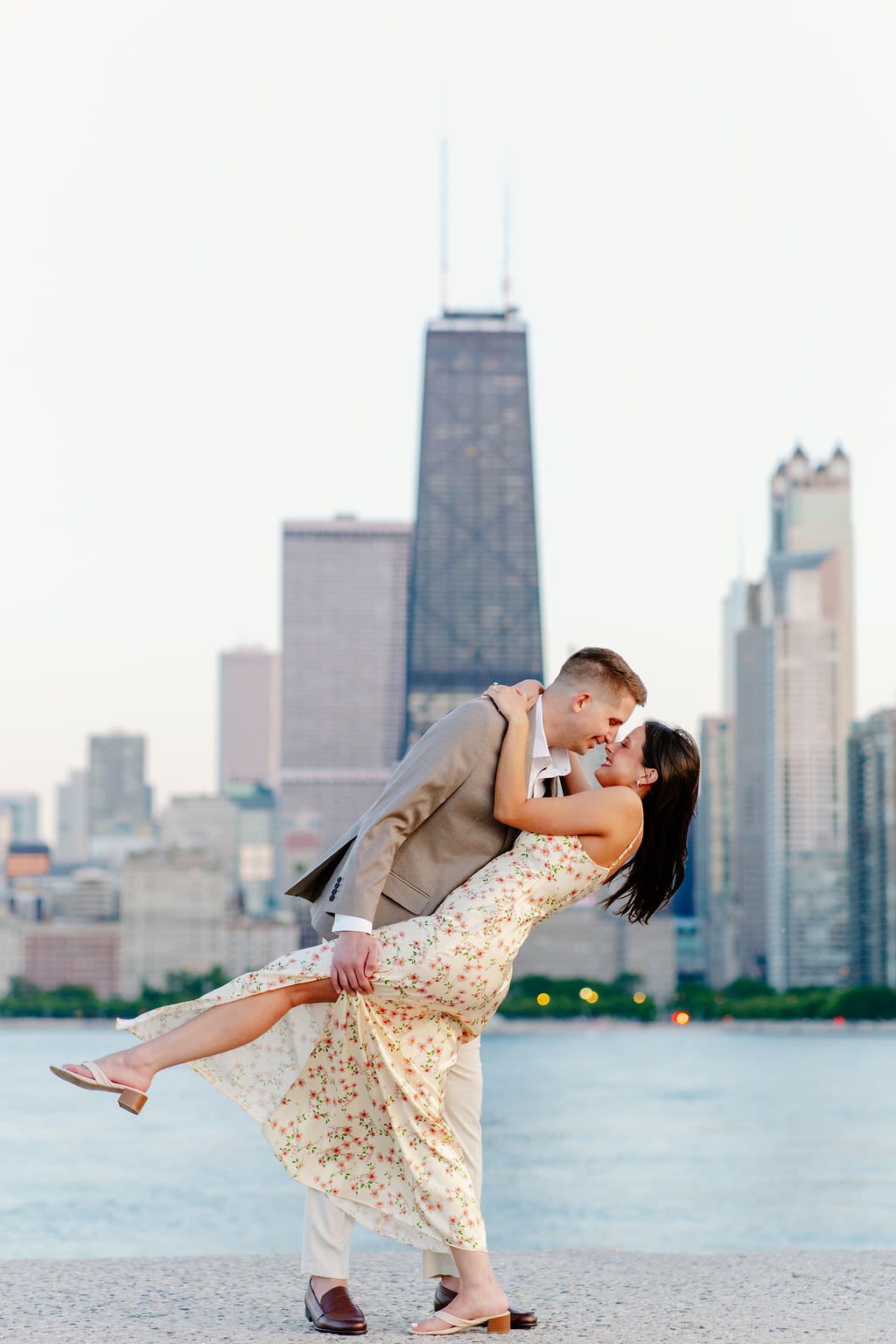 An engagement photography session at The Wrigley Building and North Ave Beach in Chicago, Illinois - 27