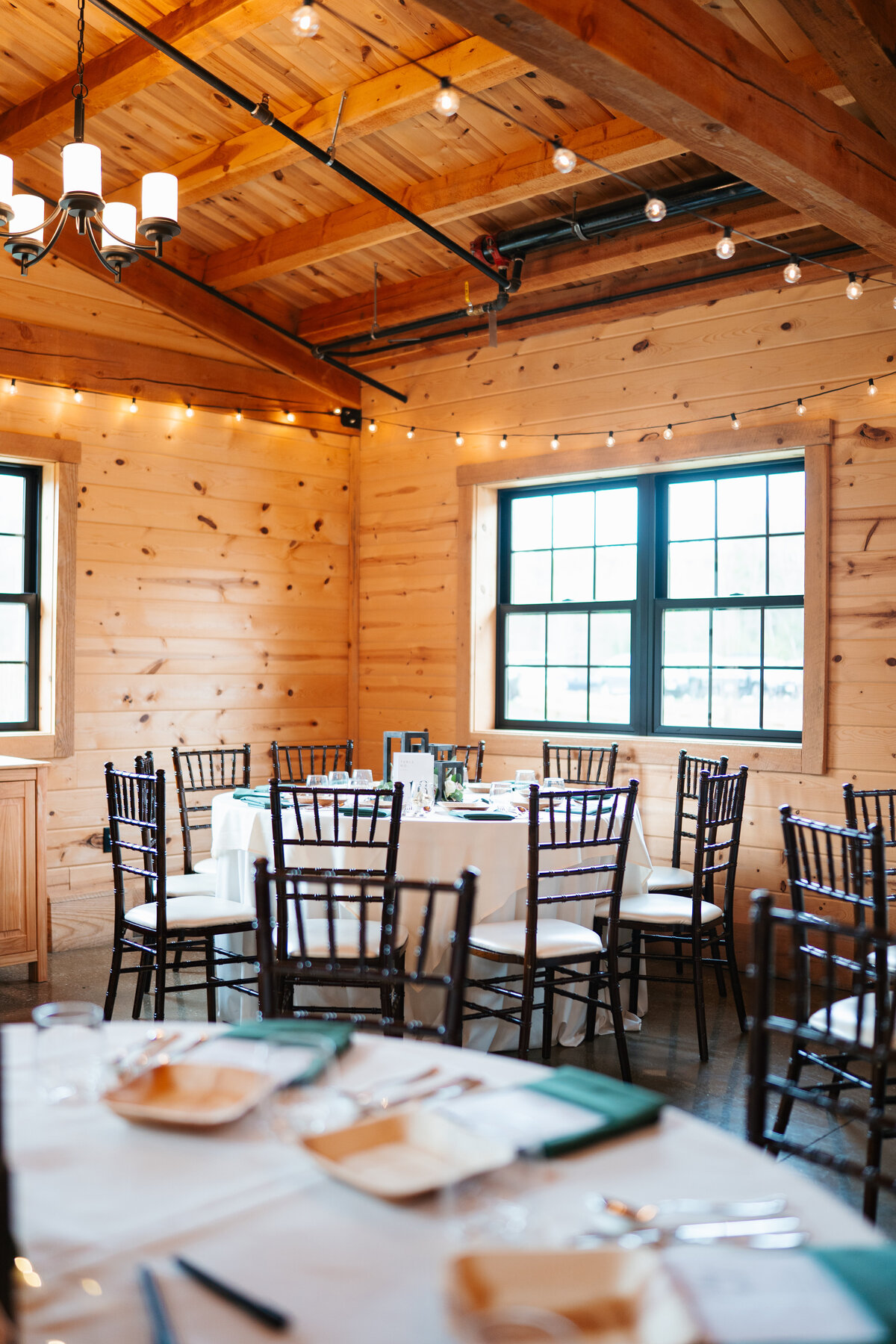 Rustic wedding details with greenery and neutral tones