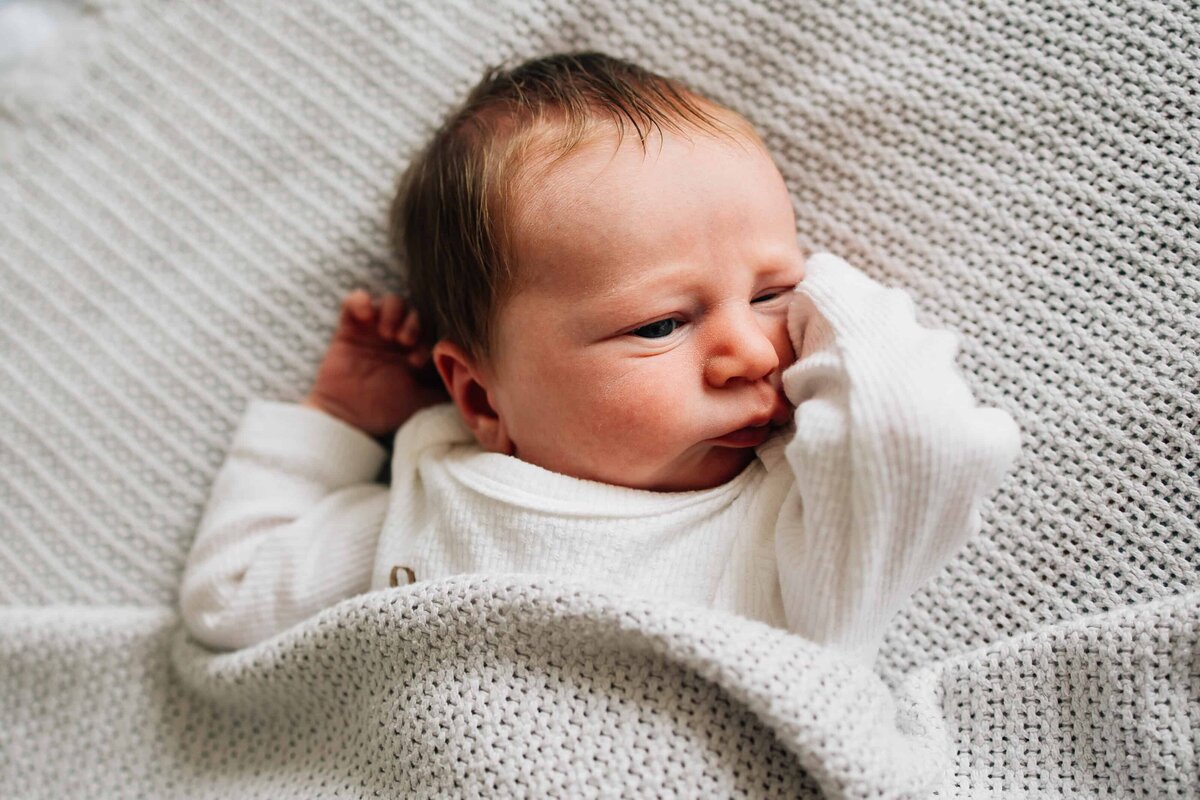 Baby in cream outfit and rug, Photography Gift Vouchers Melbourne
