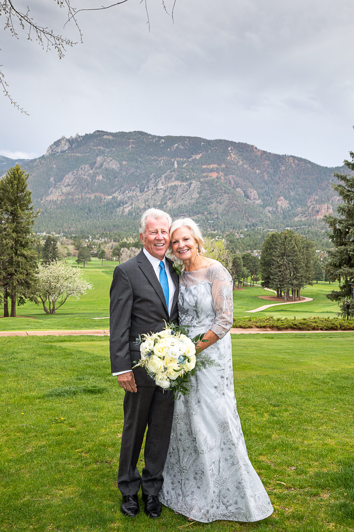 Bride and Groom with Cheyenne Mountain in the background