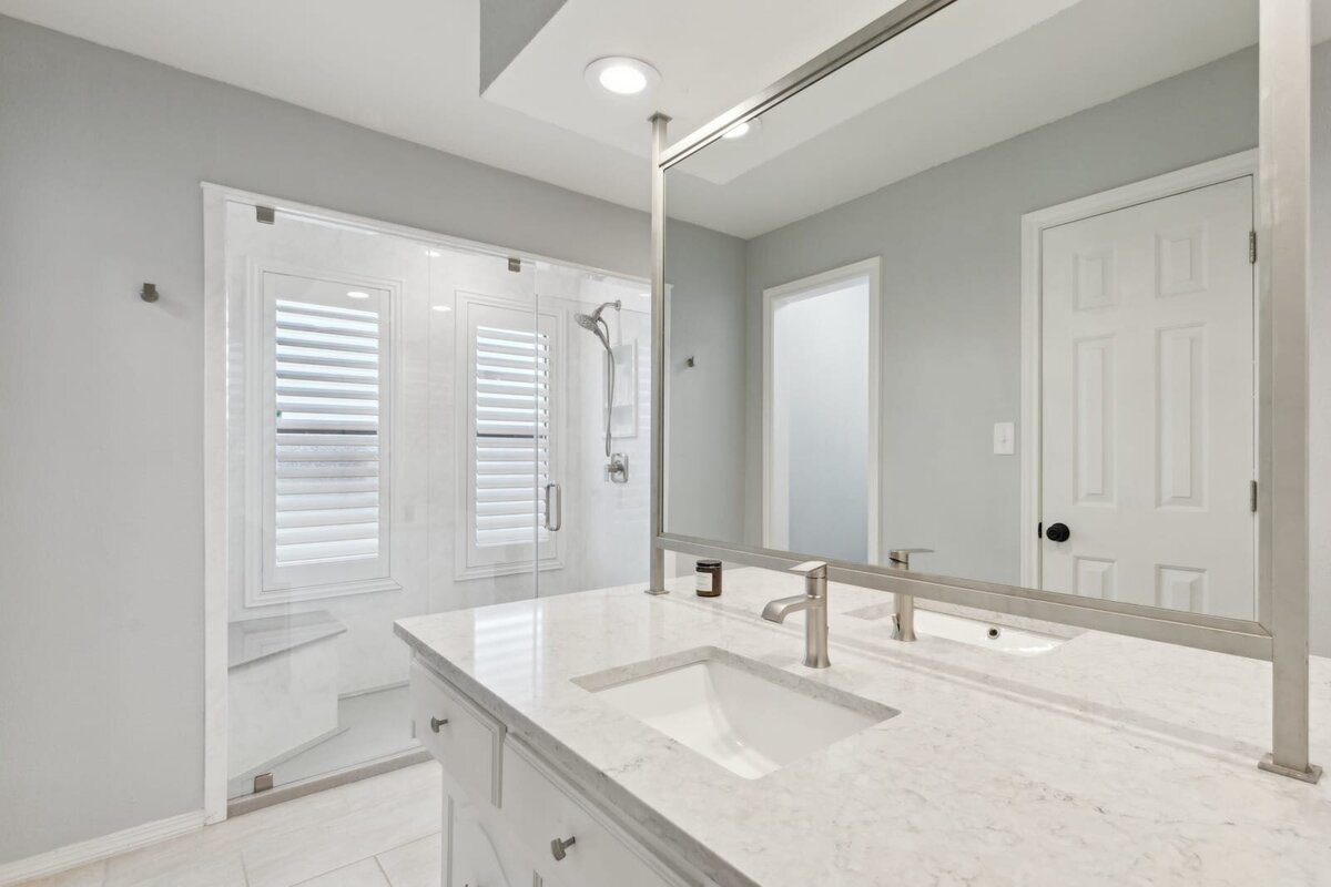 10216_shadow_way_dallas_tx_primary_bathroom_-_double_vanity_and_glass_walk_in_shower_-_haven_realty_group