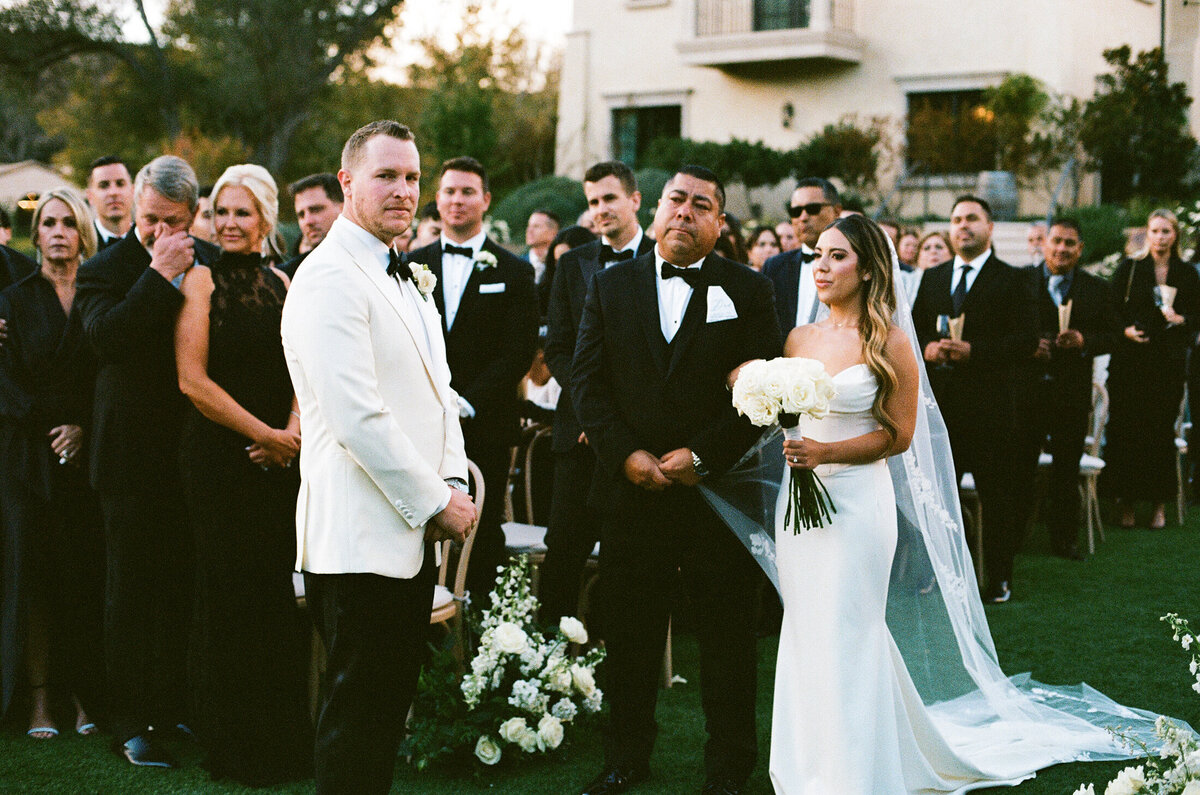 Father if the Bride giving bride away shot on 35mmfilm at Monserate Winery