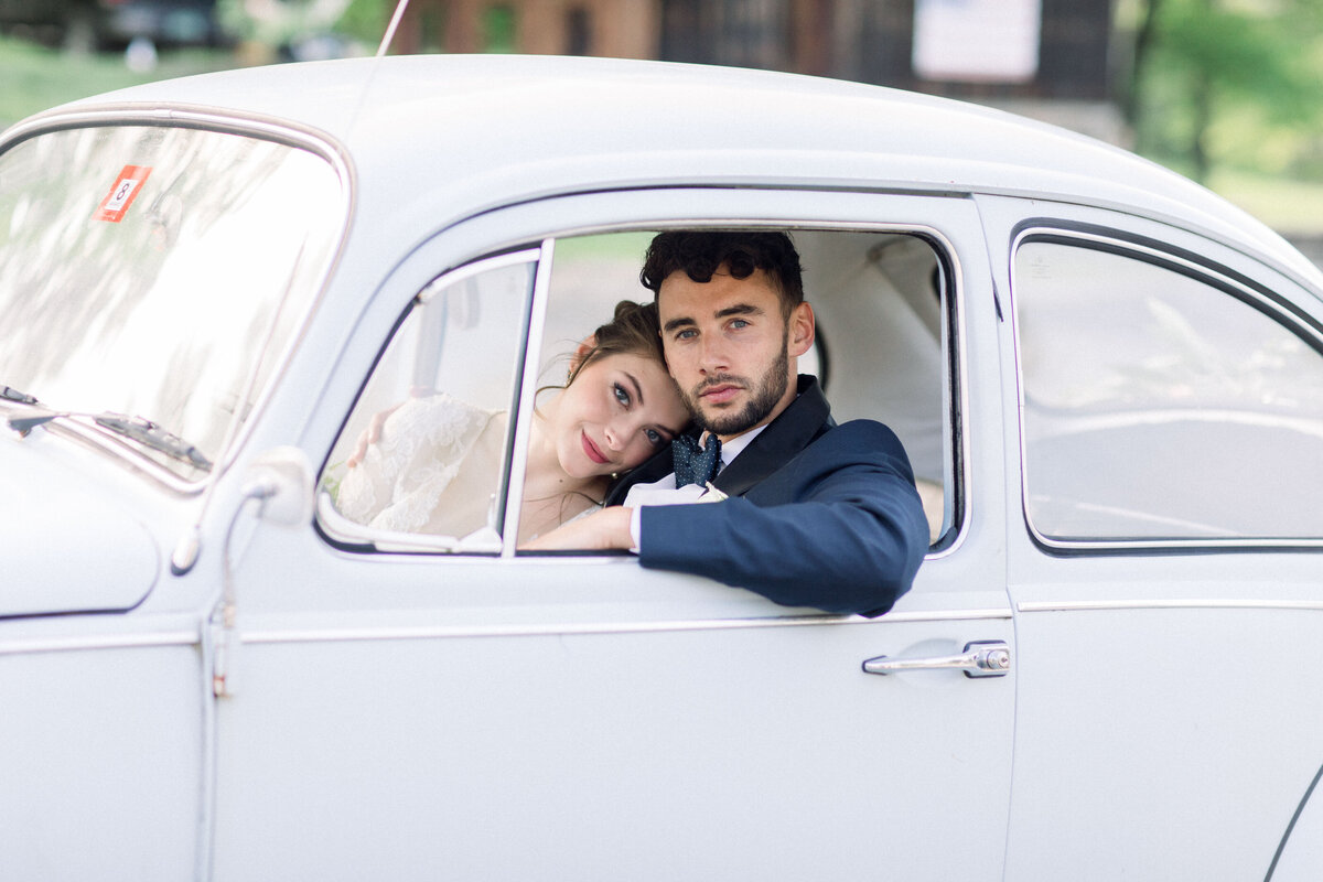 Bride and Groom in Vintage VW Beetle