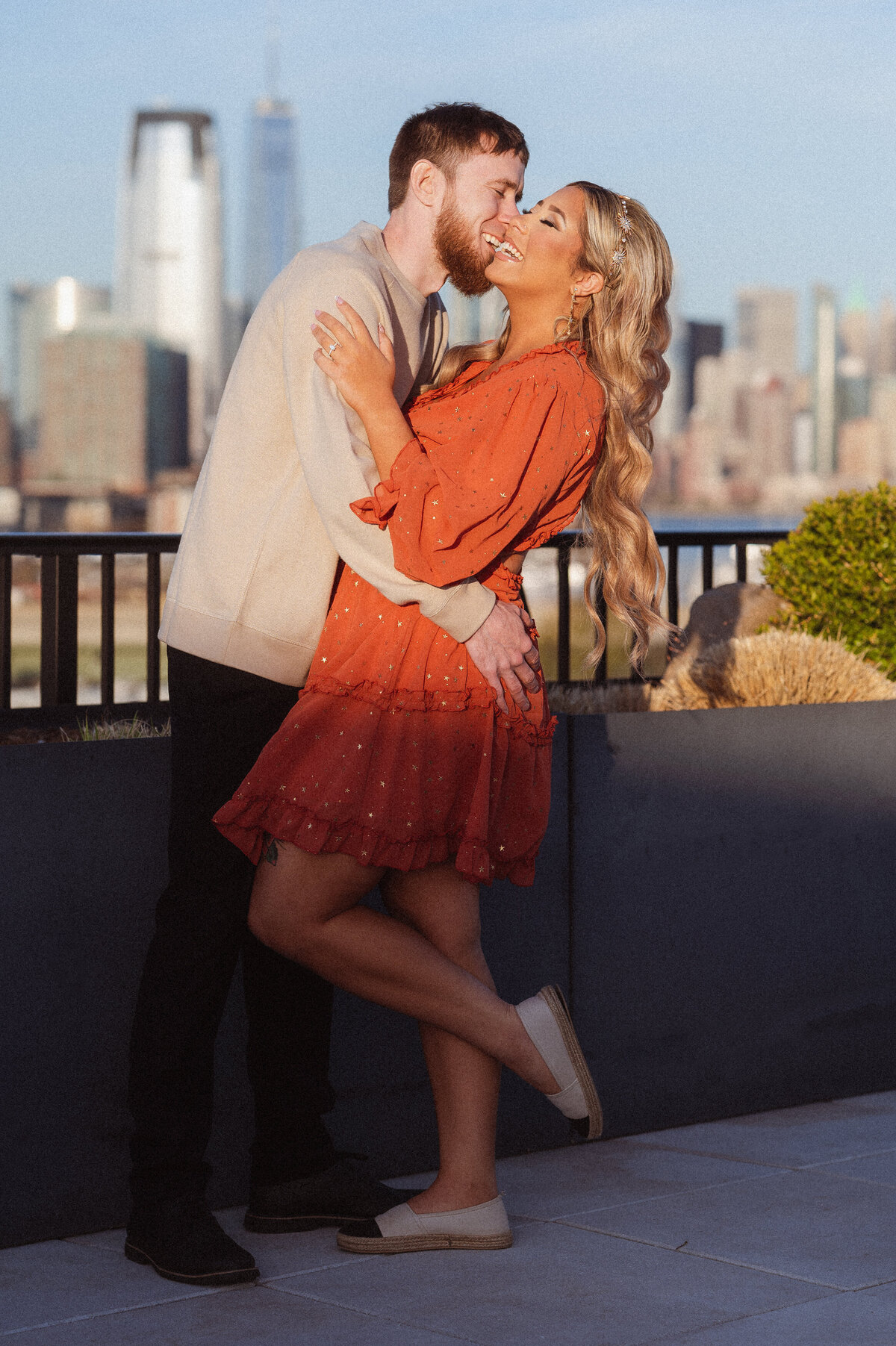 jersey-city-nj-engagement-photos-on-rooftop-with-nyc-skyline-views-by-suess-moments-photography (1 of 3)
