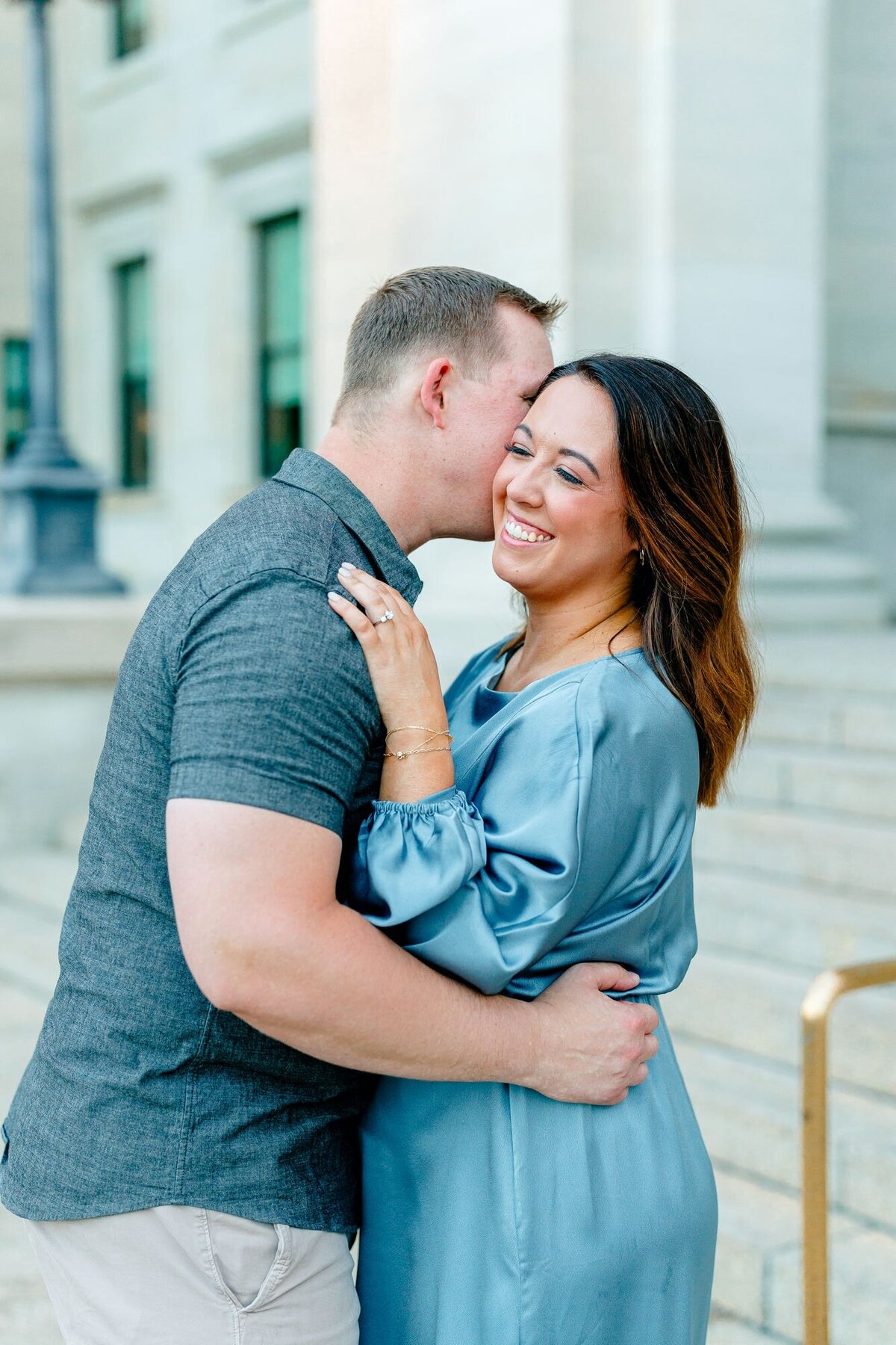 engagement-kiss-couple-pose