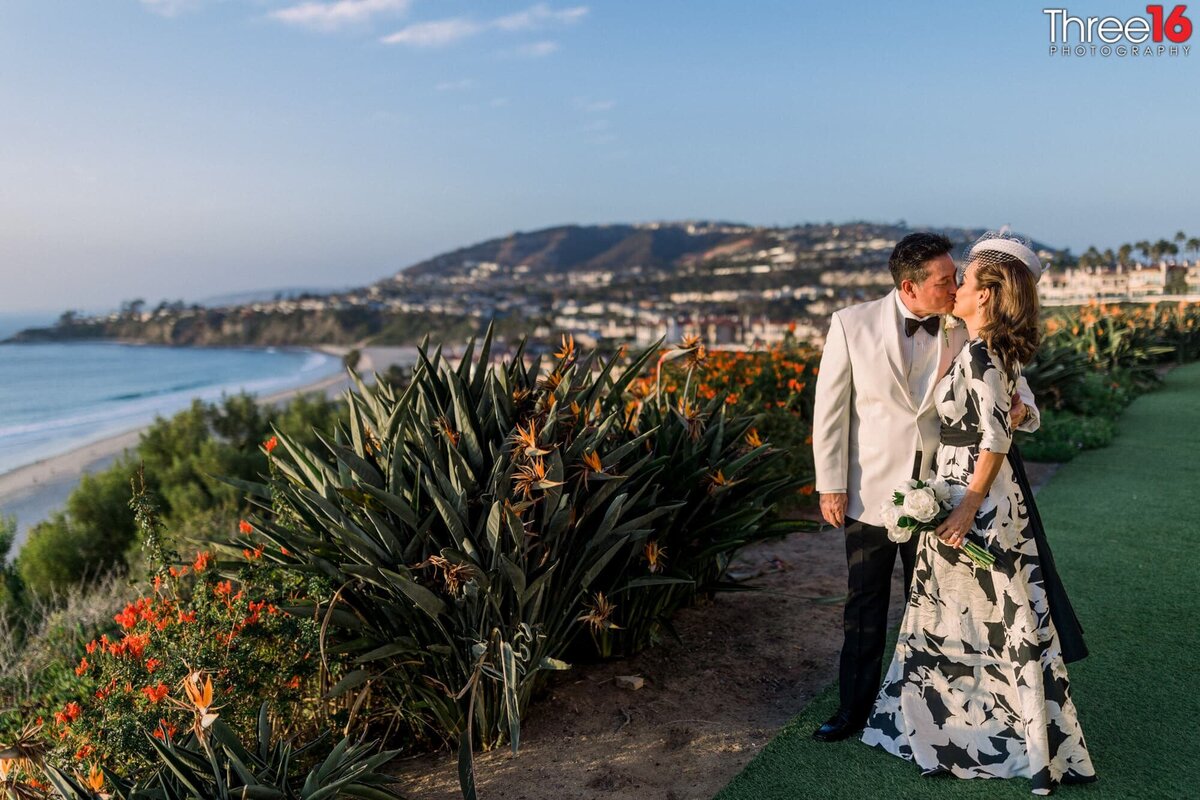 Bride and Groom share a kiss after their elopement along the California coastline