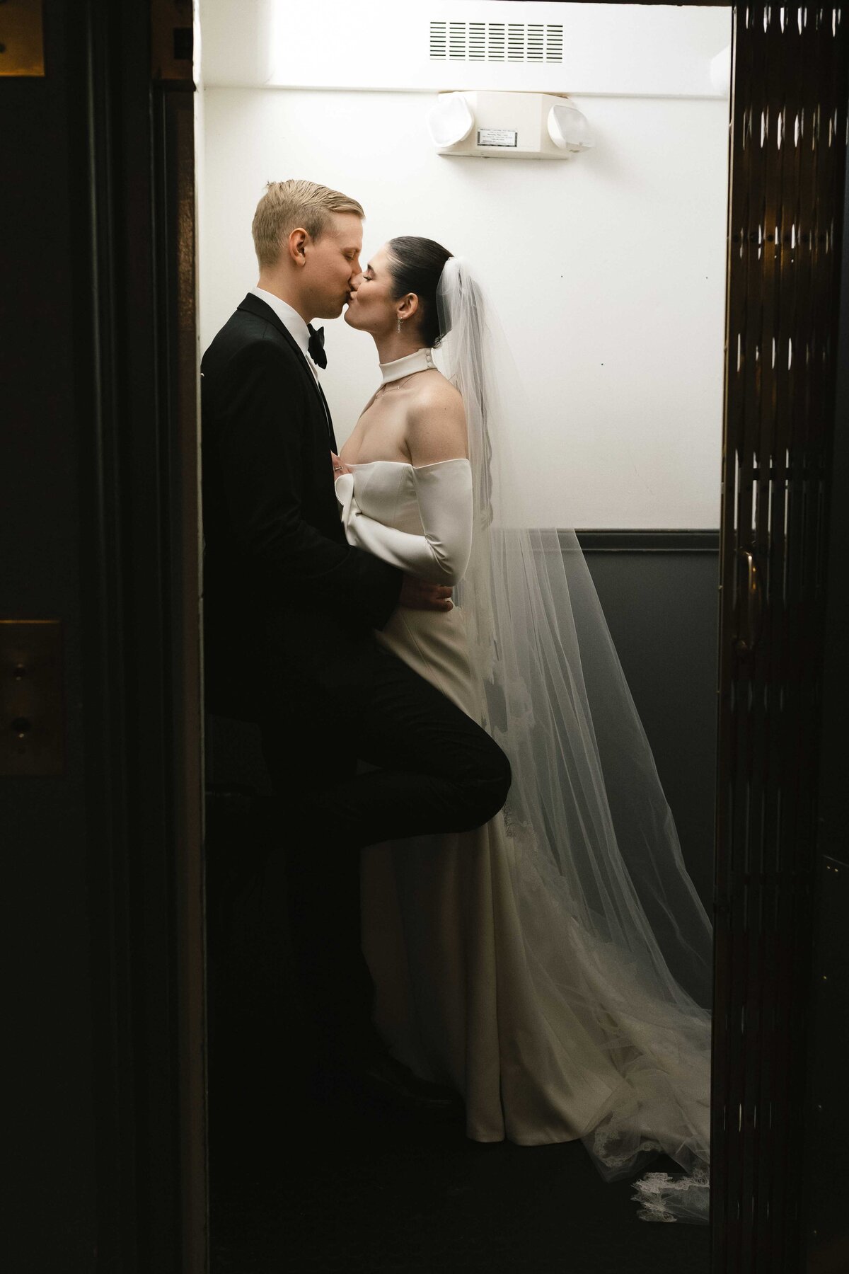 Editorial wedding portraits inside an elevator