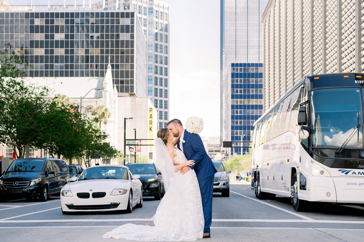 The Groom dips his Bride in downtown Tampa traffic