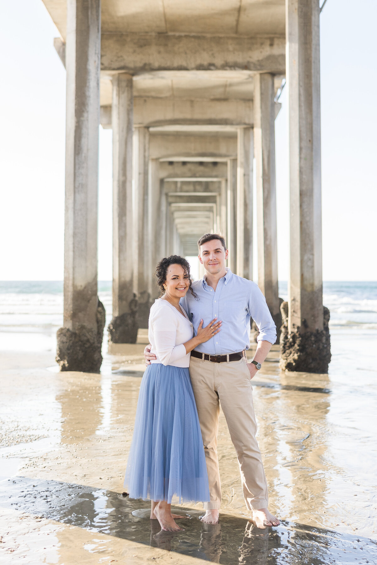 Scripps-Pier-La-Jolla-Engagement-Photoshoot-under-bridge