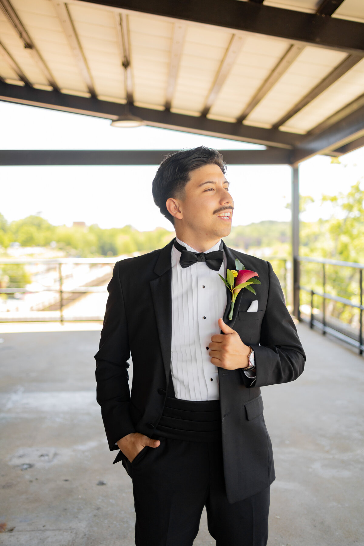 Groom-smiling-at-The-Powerhouse