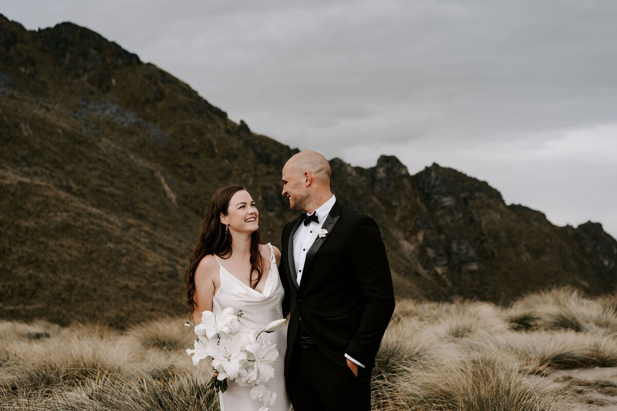 The Lovers Elopement Co - wedding couple on top of mountain