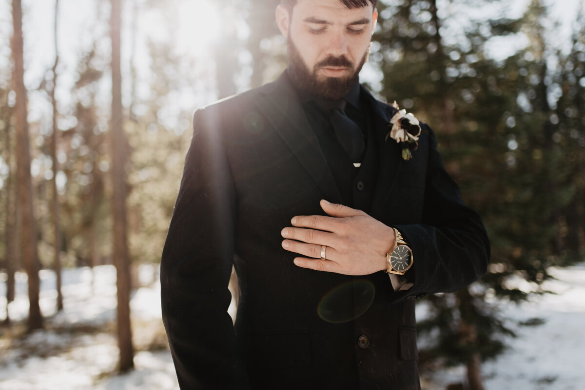Jackson Hole Photographers capture groom wedding ring on chest