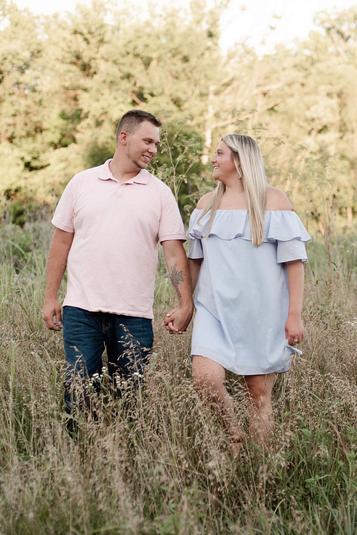 Cute outfits for couples portraits while walking in photo taken by Michelle Lynn Photography located near Louisville, Kentucky