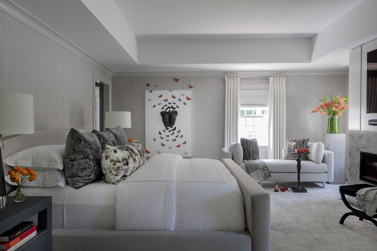 Modern primary bedroom retreat designed by Boston interior designer Tiffany Barqawi, featuring layered neutrals and custom furnishings