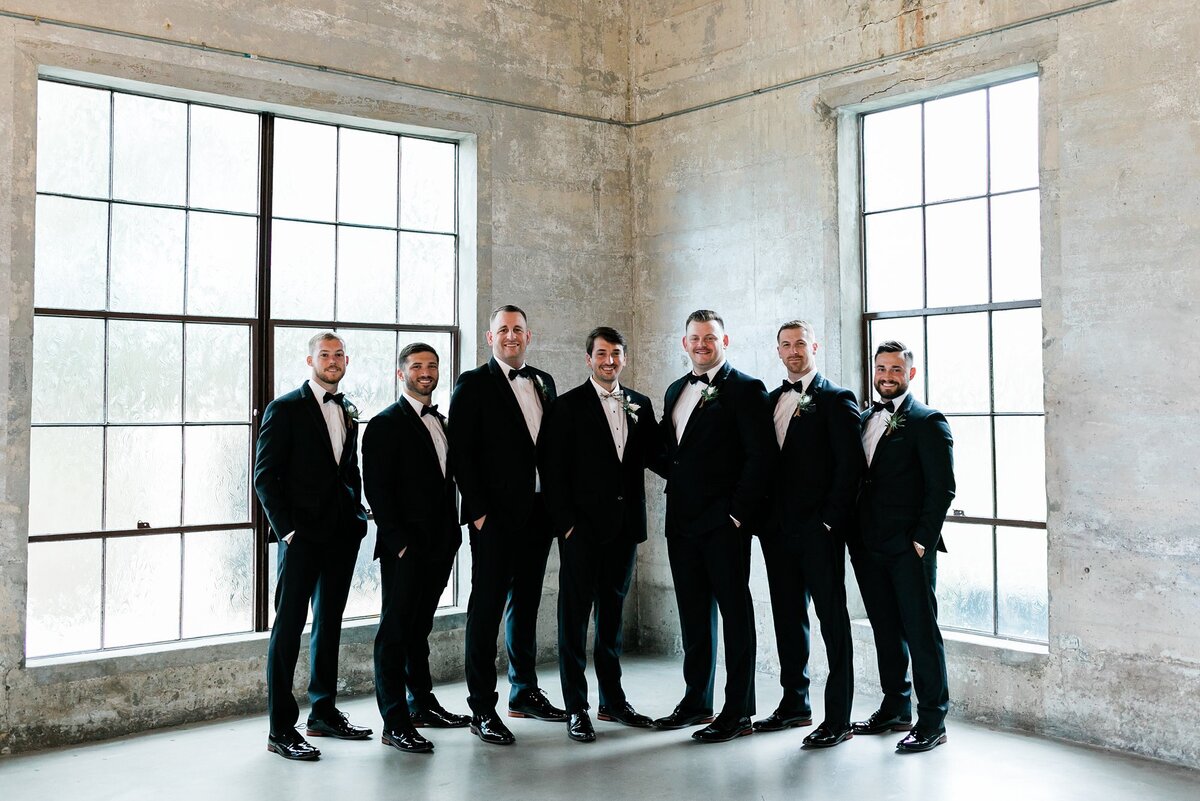 Groomsmen portraits in the chapel at Olde Dobbin Station