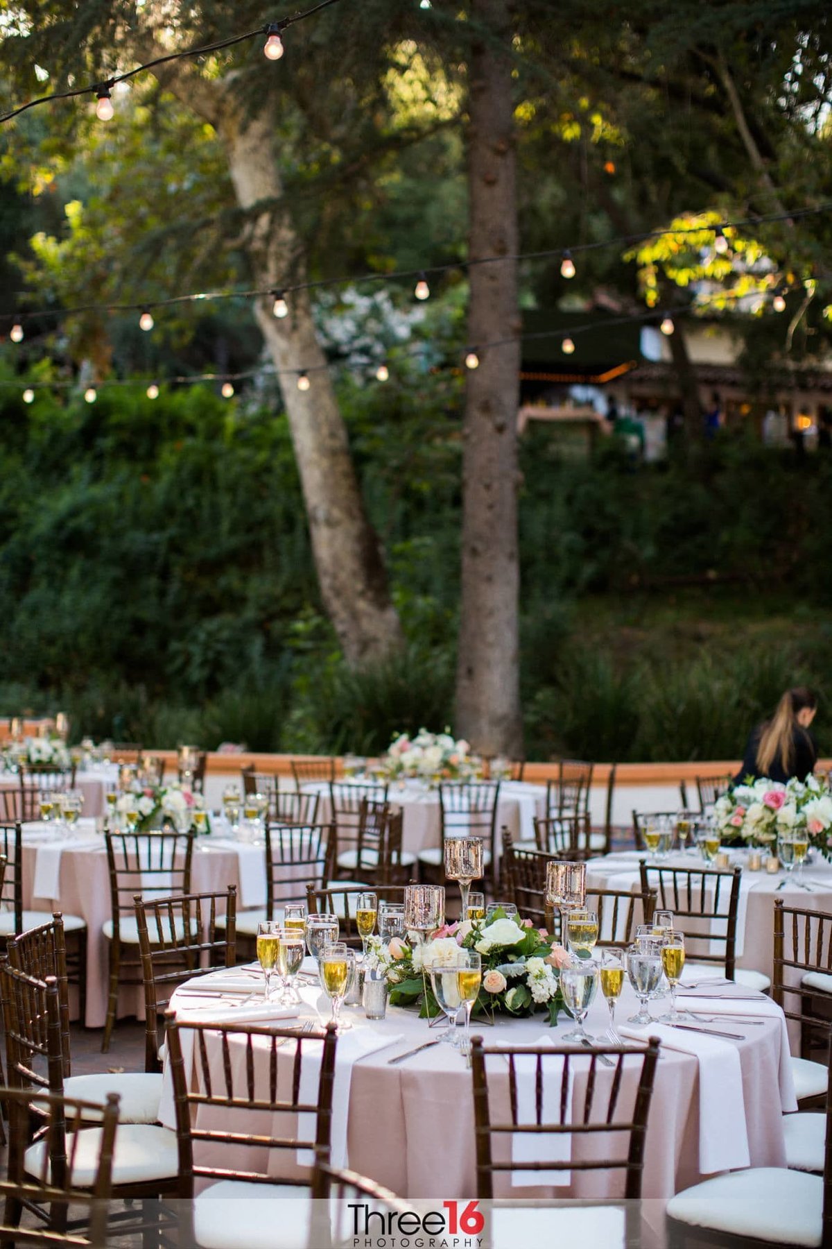 Outdoor table setup at wedding reception