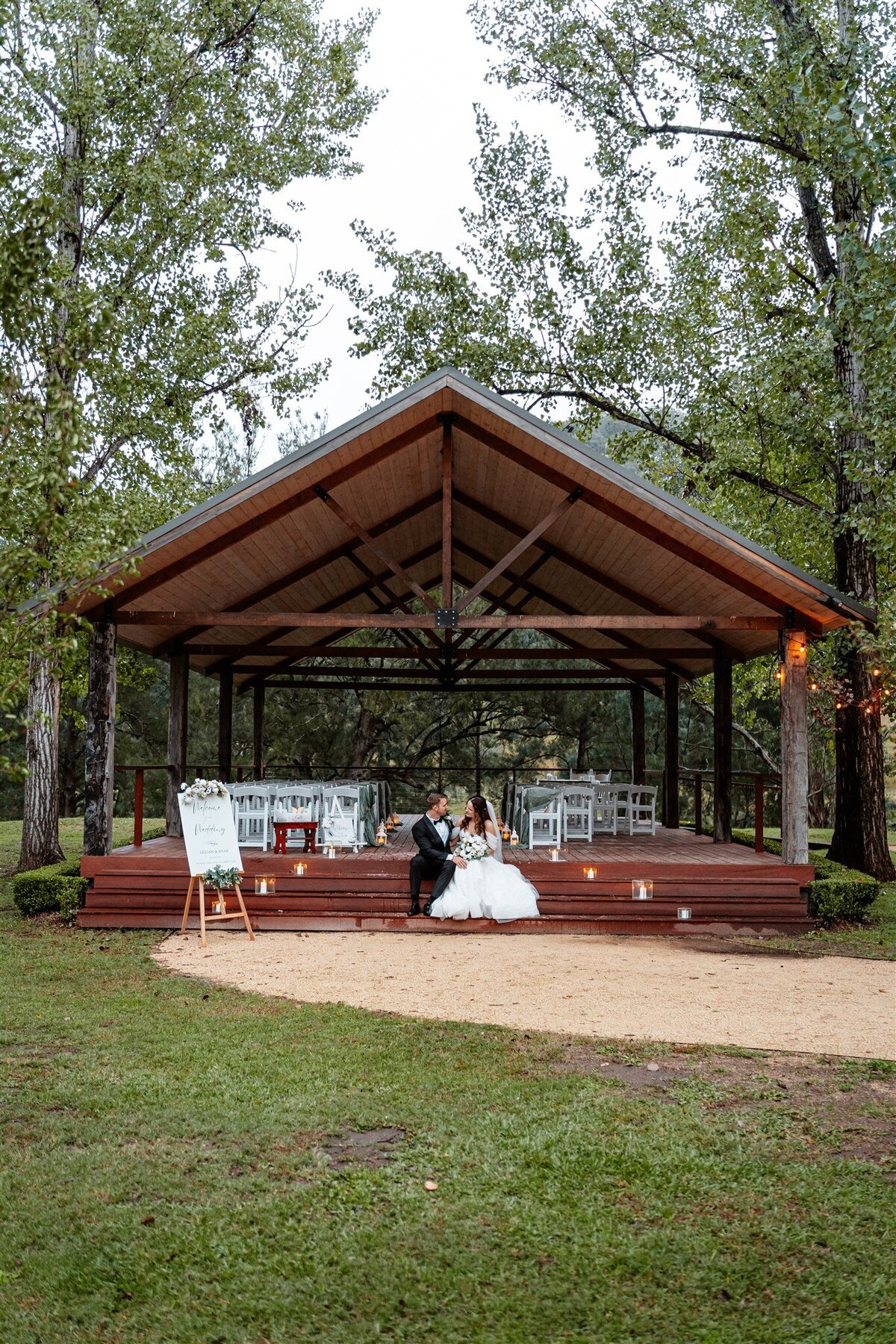A captivating portrayal capturing the essence of love and joy as the newlyweds embark on their journey together through a timeless wedding photoshoot.