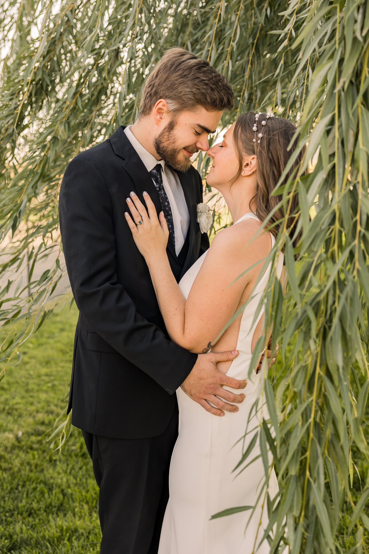 Bride and groom at Crooked Willow wedding venue in Osakis MN