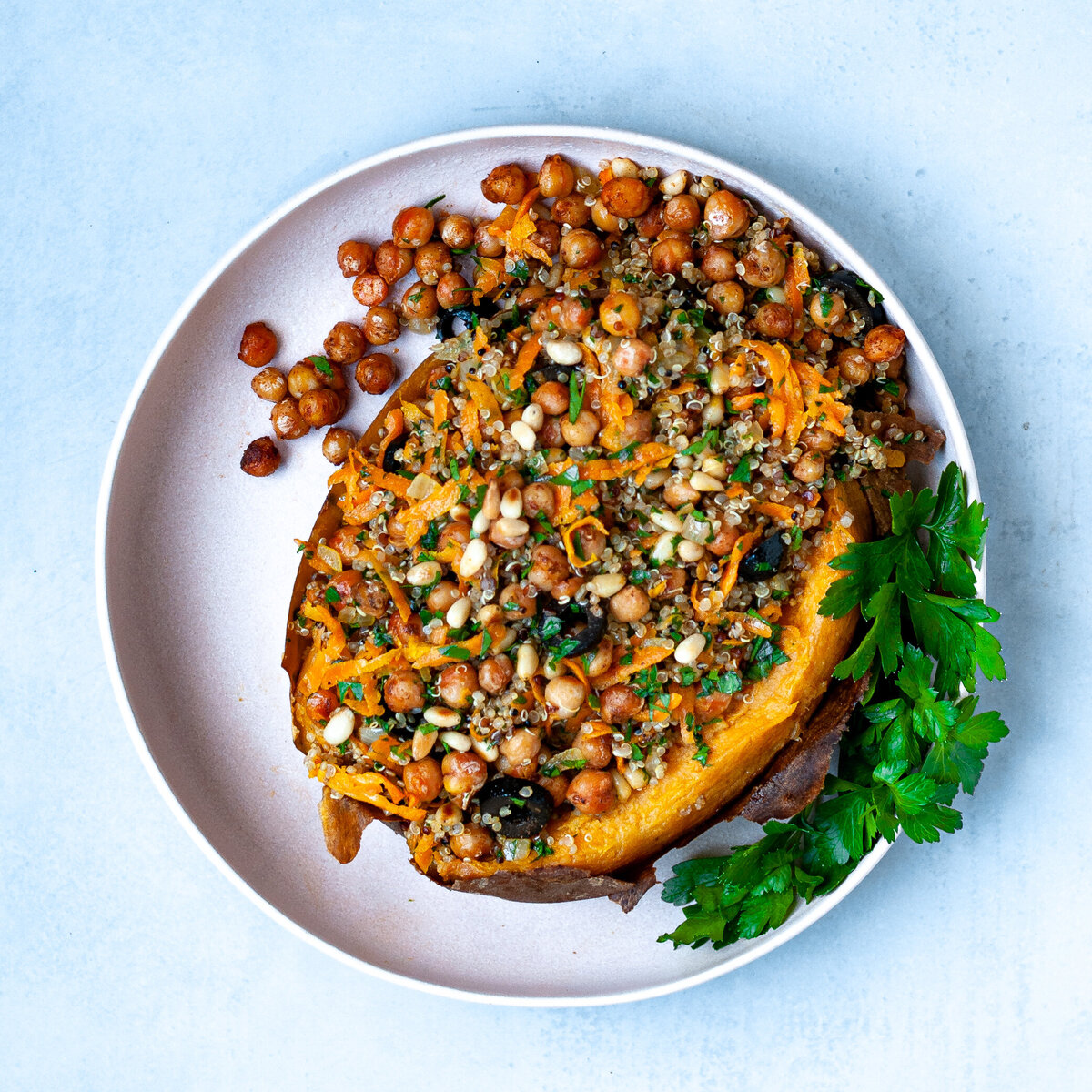 Alicja Sieronski Food Photograper and Food Stylist -- fooditrust baked sweet potato stuffed with chickpeas quinoa olives and pine nuts_