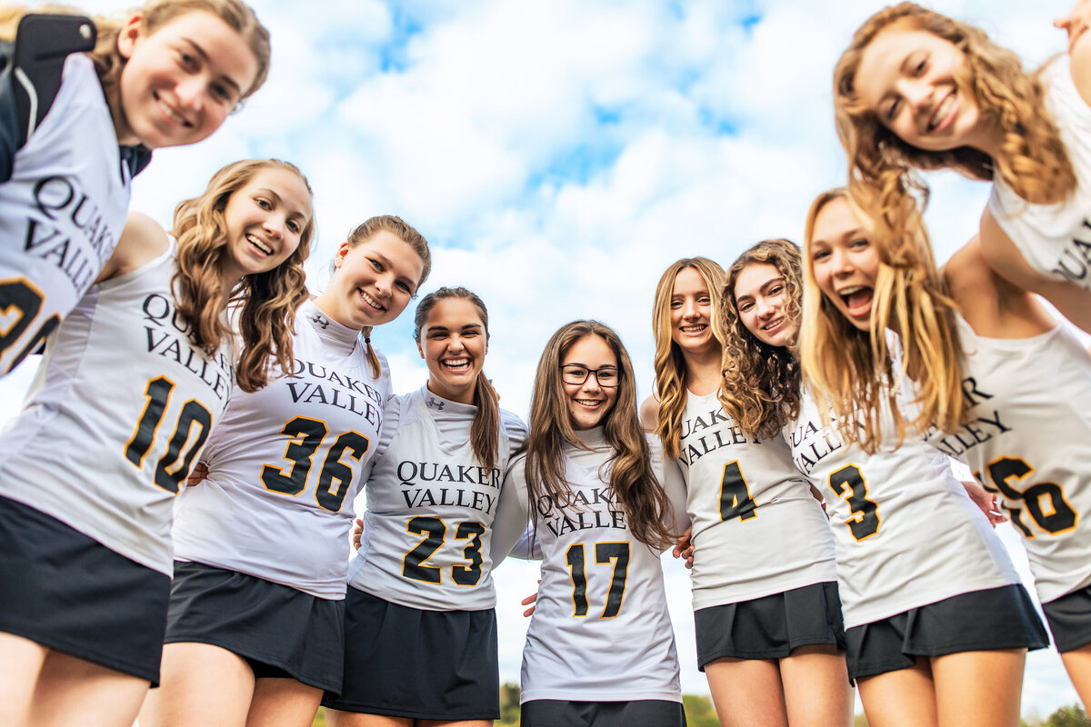 A team of senior lacrosse players poses for a portrait near Sewickley Pennsylvania