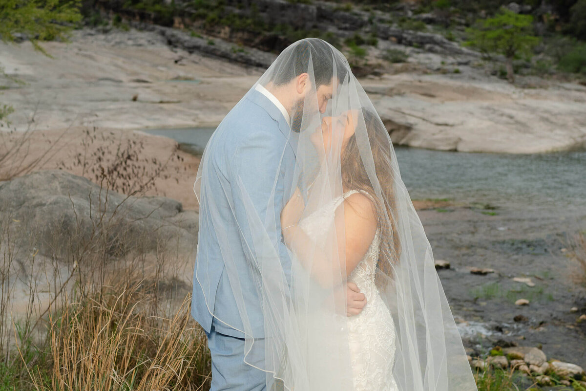 couple at a ranch in the mountains