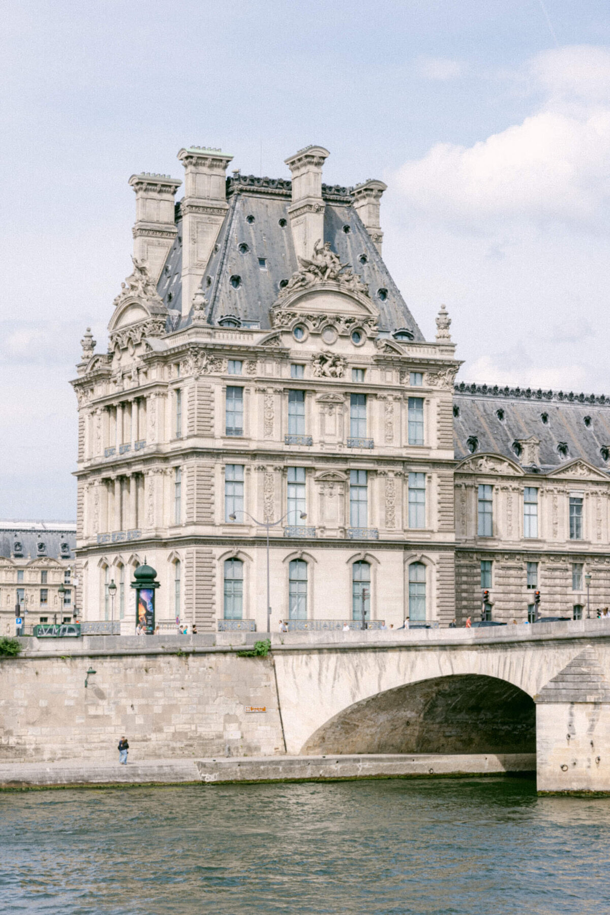 A wedding photo showing off the architecture of Paris