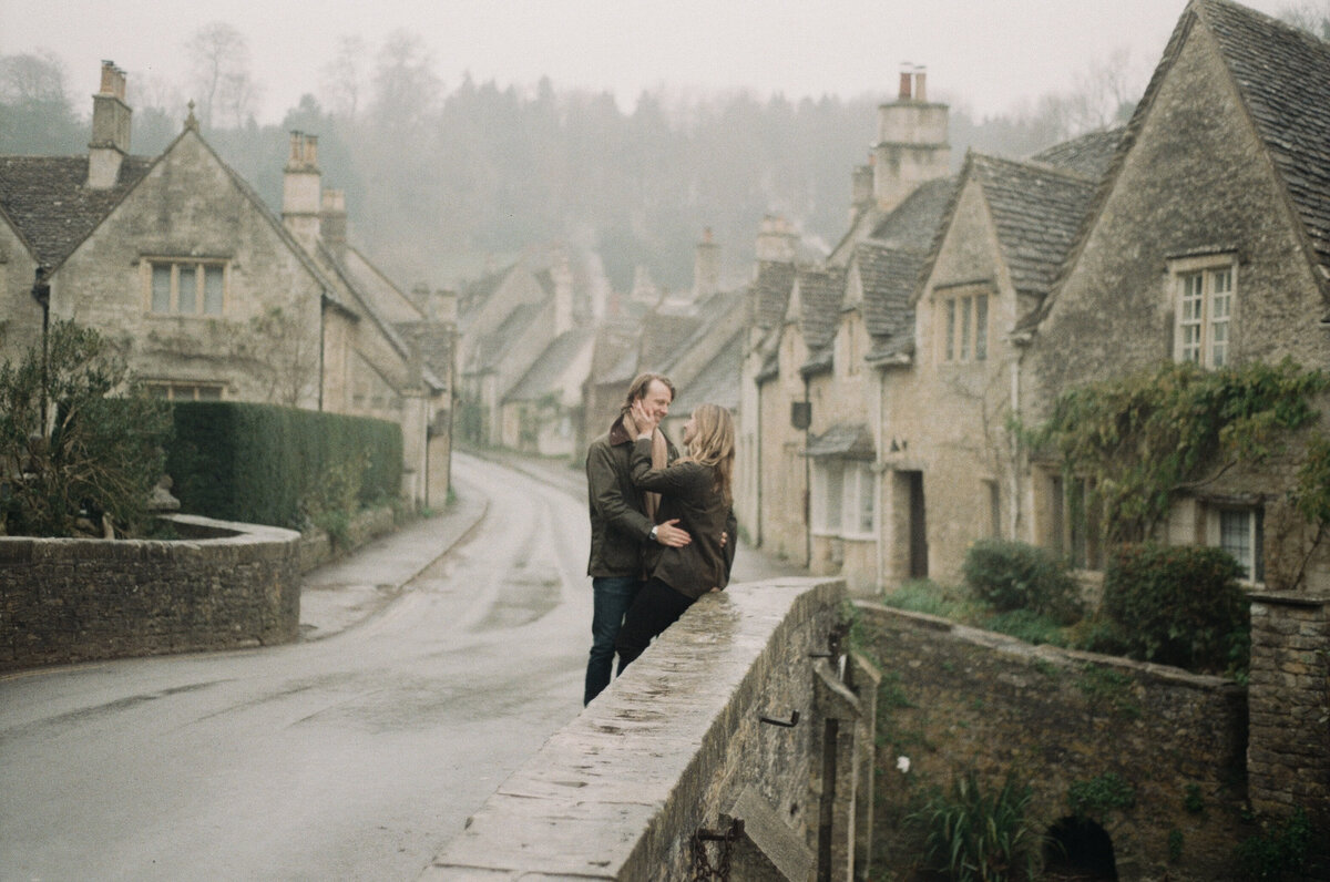 Engagement portraits in Castle Combe, Cotswolds captured on 35mm film