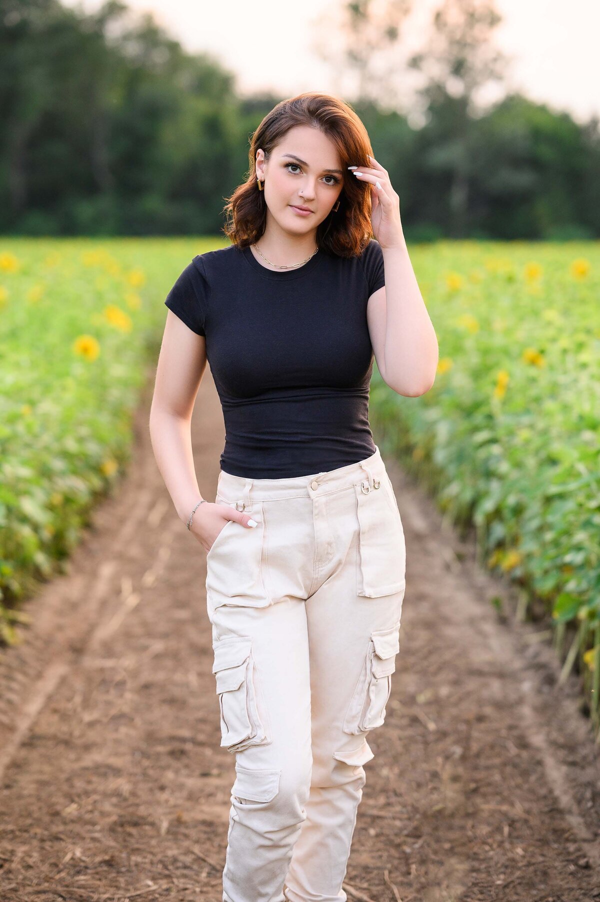 Celebrate your high school senior with personalized portrait sessions, including cap and gown photos, by Leslie Q Photography. Offering both studio and outdoor options to capture their unique personality and milestone. Serving Michiana, Northern Indiana, South Bend, New Carlisle, and surrounding areas.