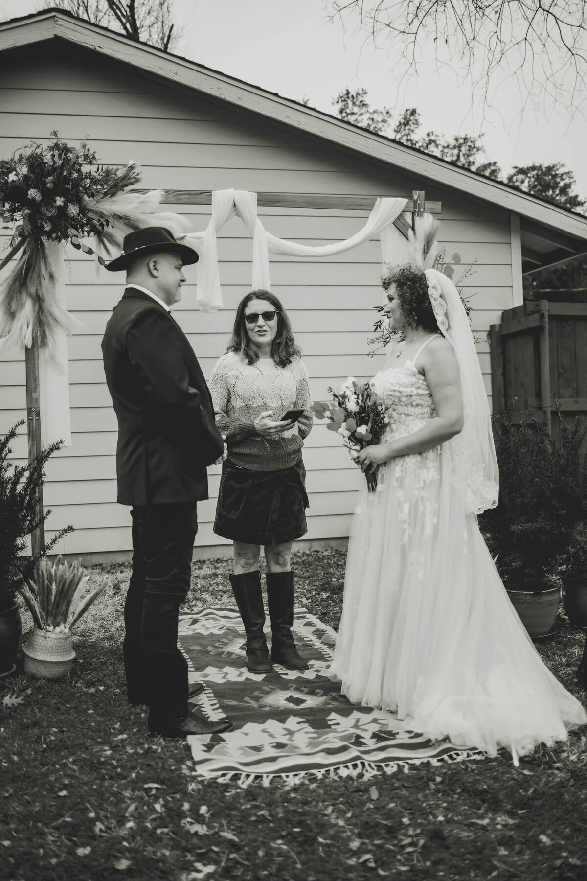 a bride and groom exchange vows