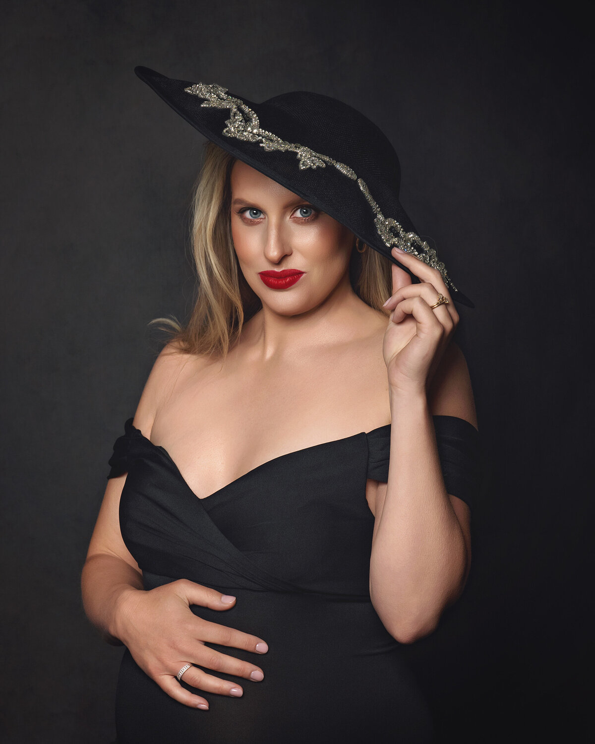 Kirkland fine art maternity photographer at AMM Fine Art Studio — timeless portraits celebrating motherhood with luxury styling.