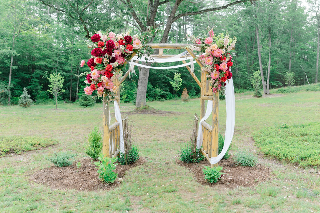 Outdoor wedding ceremony archway for Maine wedding