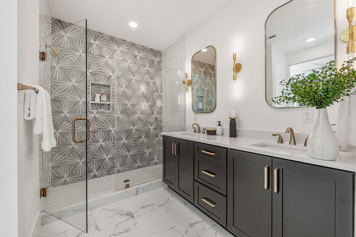 master bathroom with hexagon gray tile and walk in shower