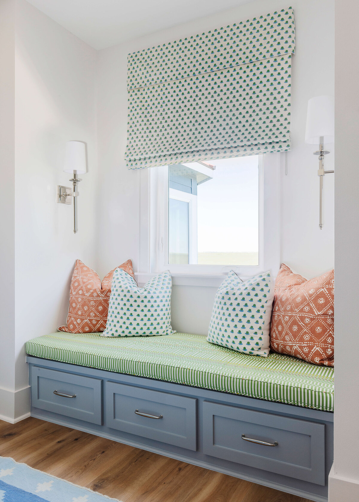 oyster creek studios lighthouse on the lake blue window bench with green cushion red and white pillows