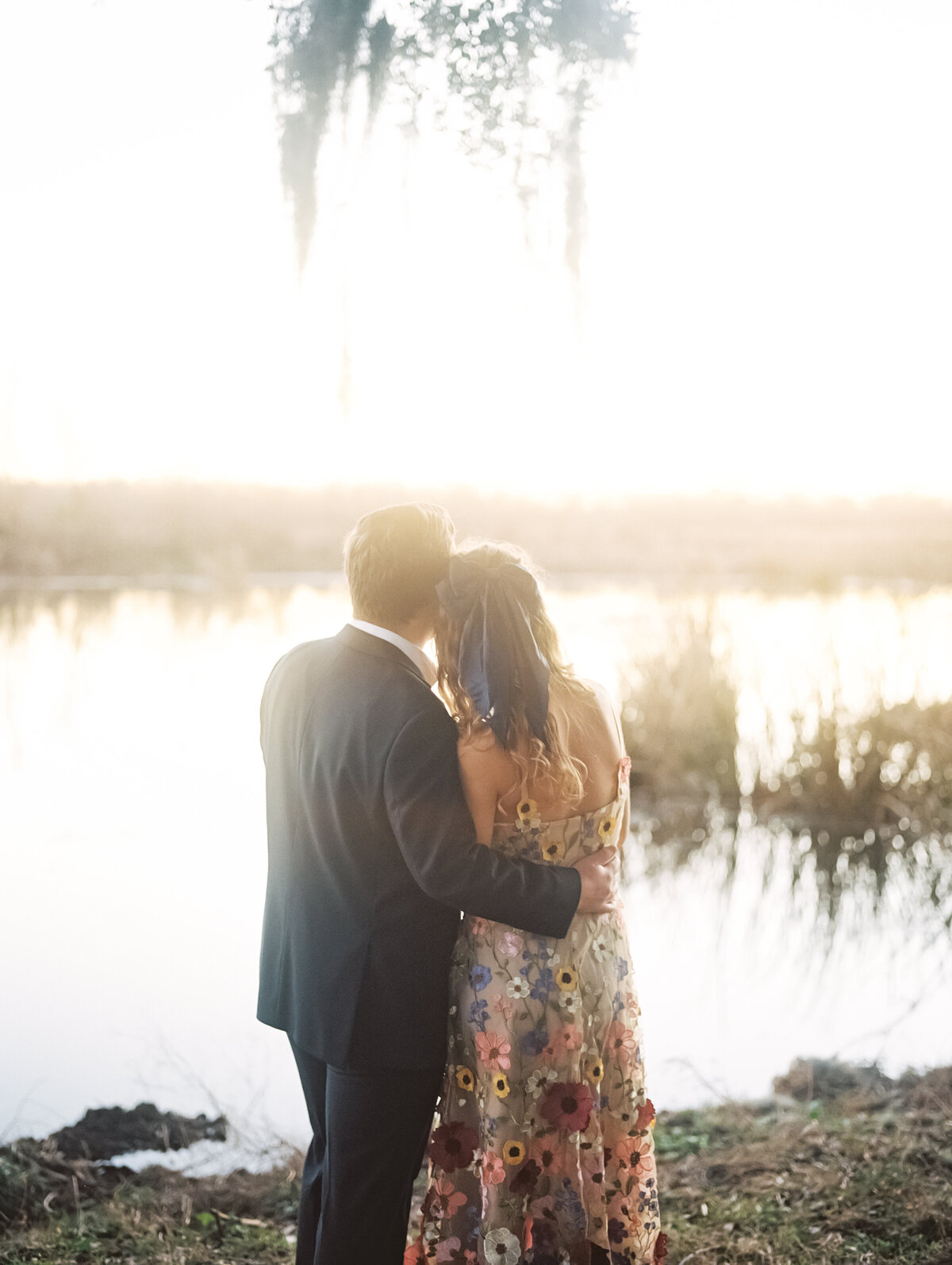 engaged couple in houston texas at golden hour colorful dress