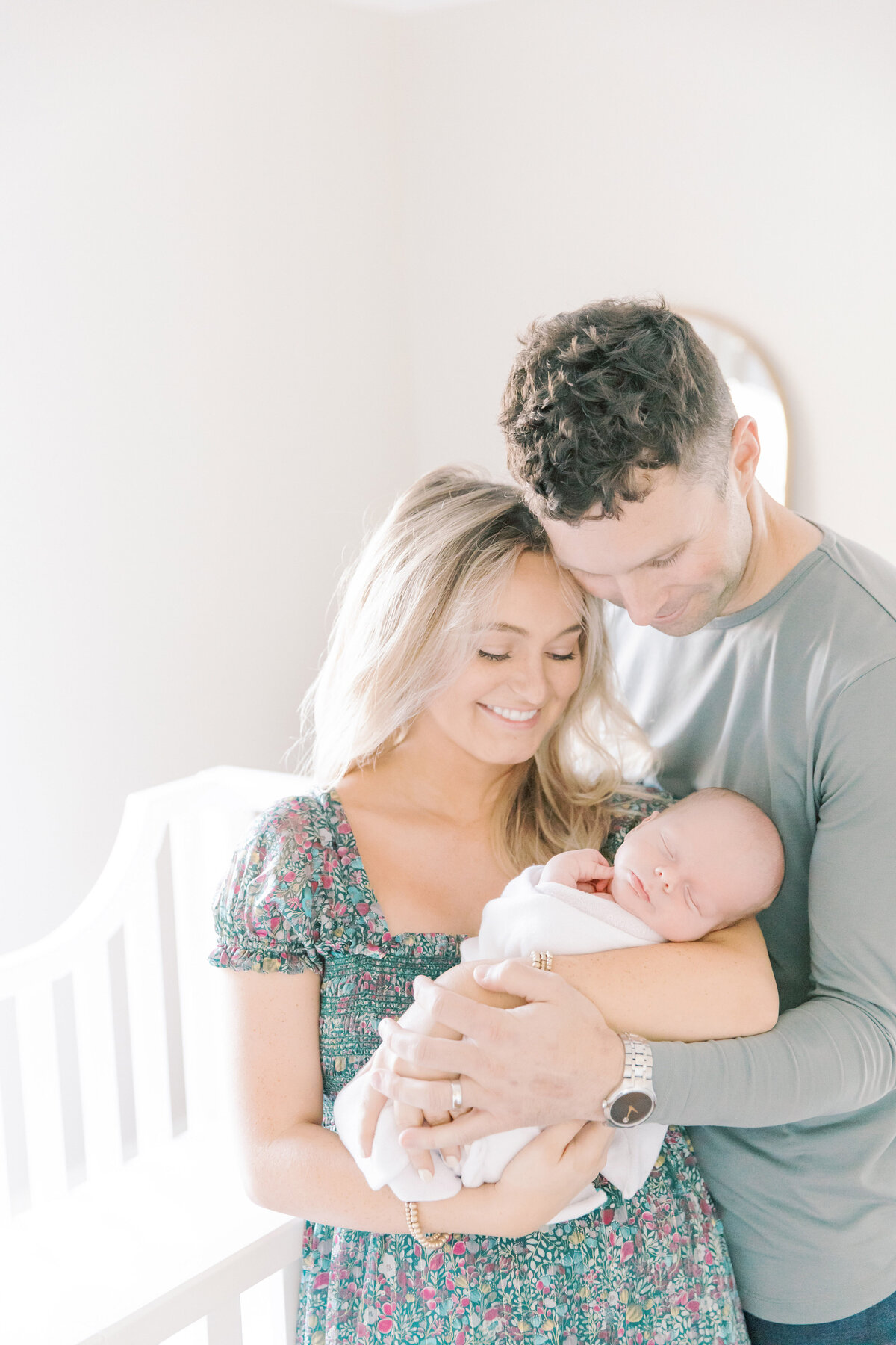 new parents looking at first born son - katie Petrick Photography