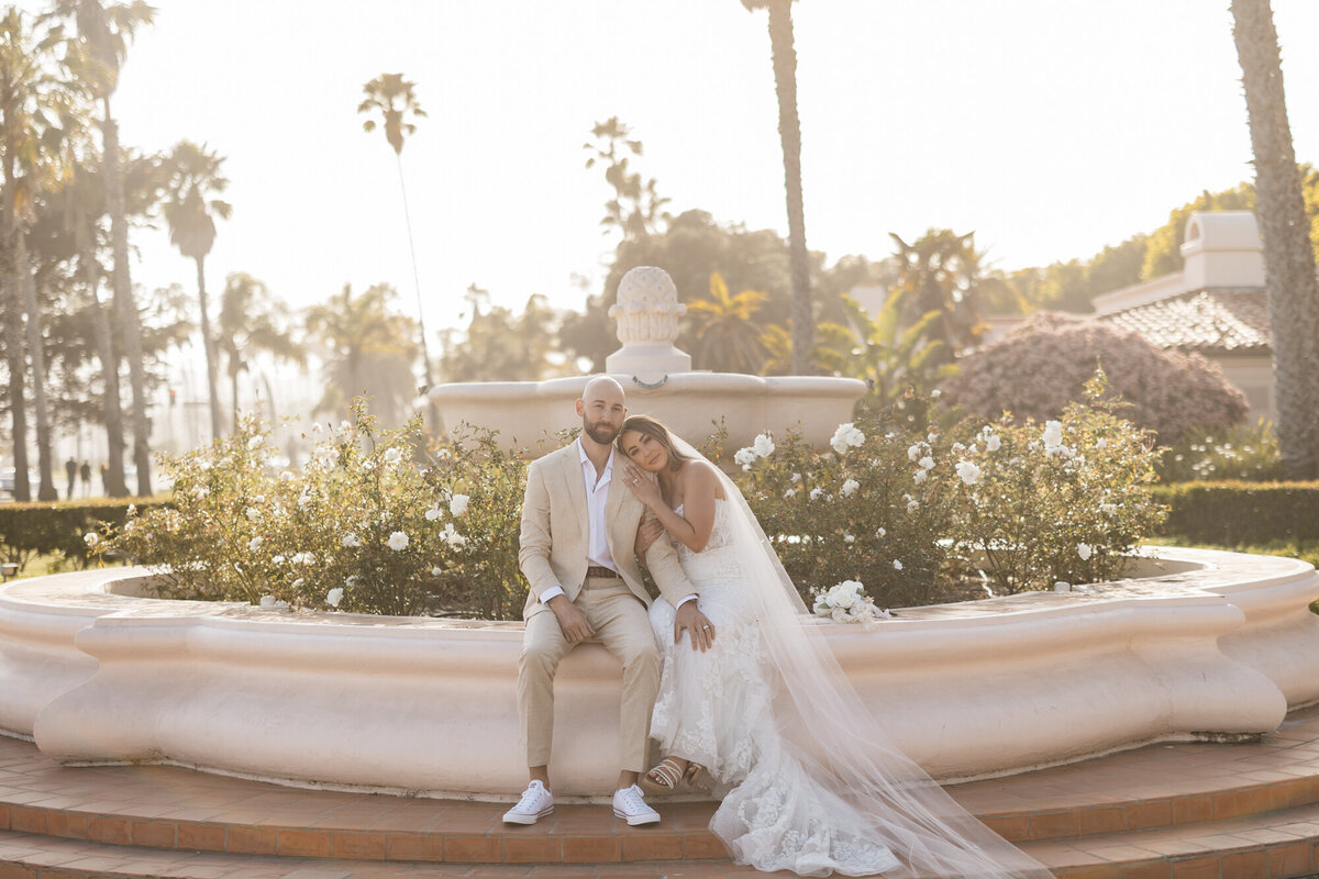 Bride and groom posing for a portrait at Hilton Beachfront Resort Santa Barbara