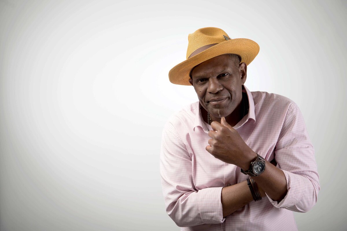 Artistic portrait of man with straw hat