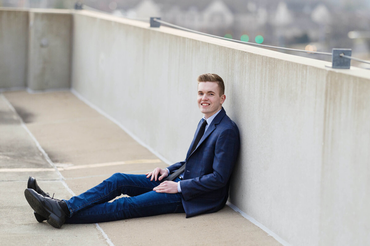 brand-photos-man-sitting-on-roof-1