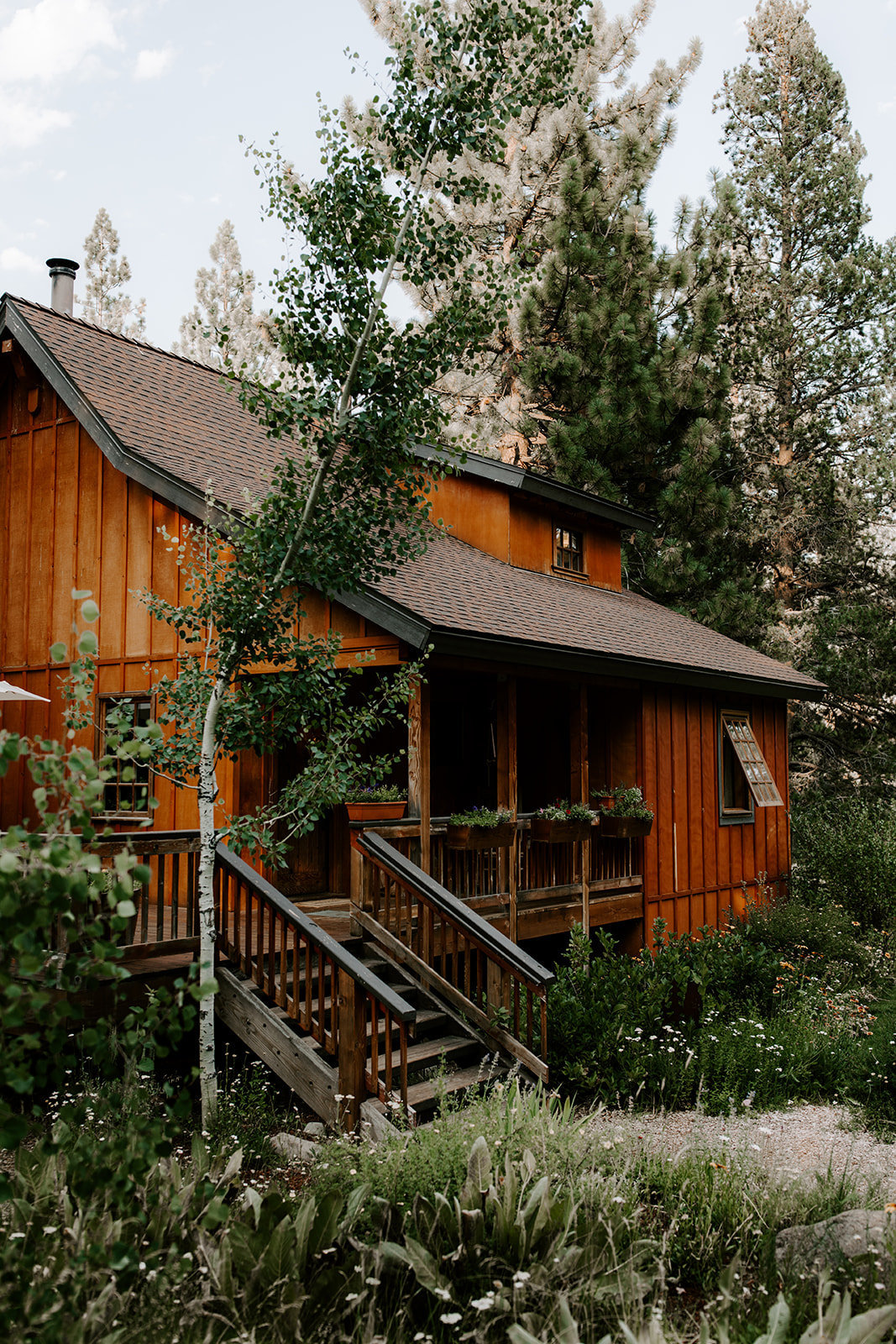Truckee Wedding Planners log cabin at wedding venue Mitchells Mountain Meadows Sierraville near Truckee, Joy of Life Events image by The Shepards Photography